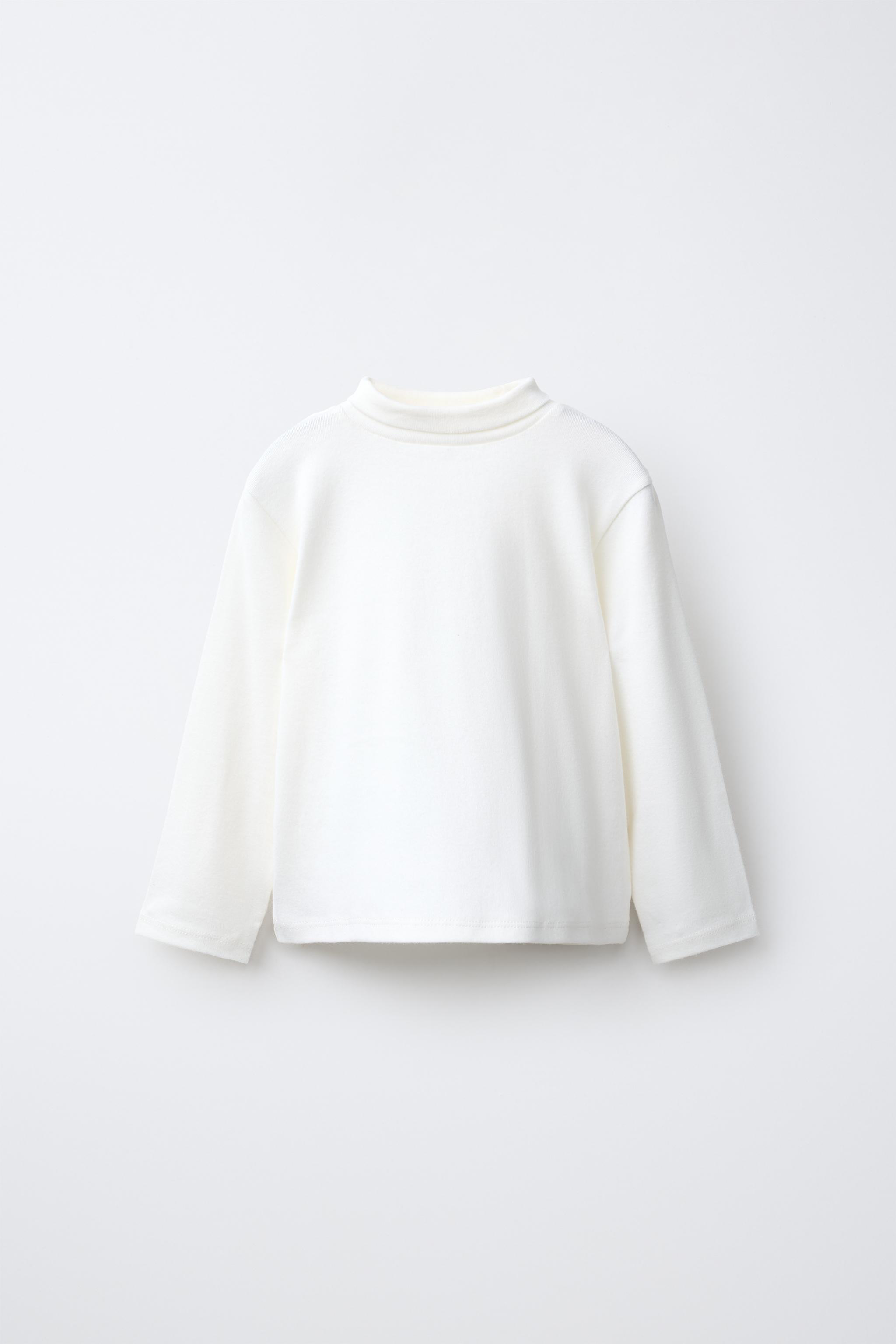CAMISETA CUELLO VUELTO LISA
