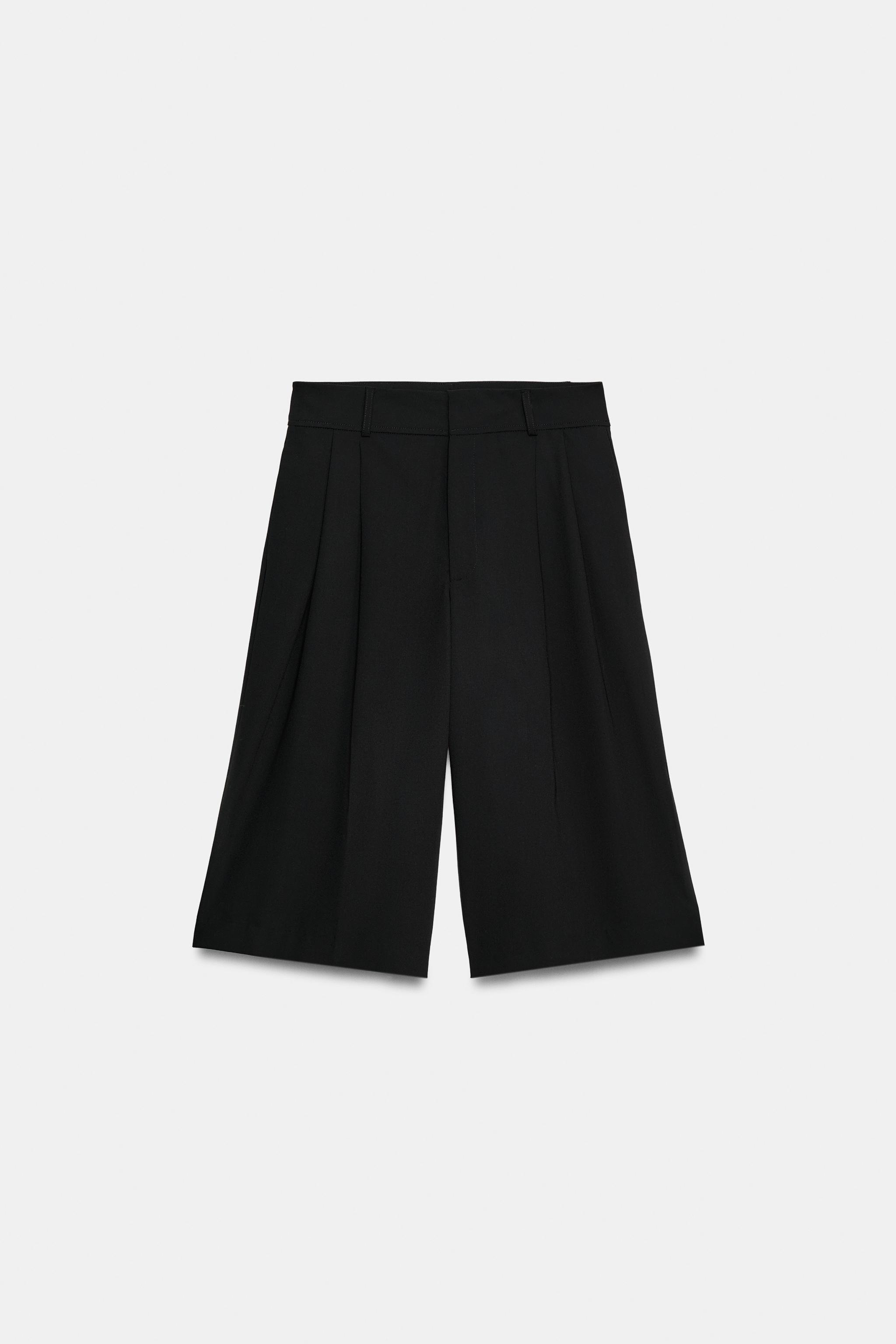 PLEATED FAUX LEATHER LONG BERMUDA SHORTS