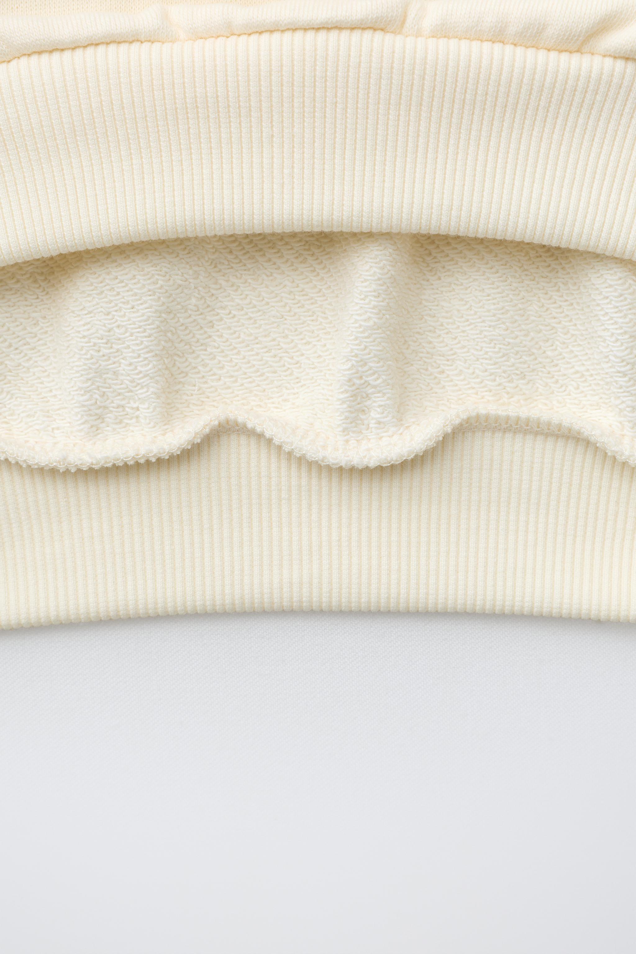 RAGLAN SLEEVE SWEATSHIRT WITH LABEL