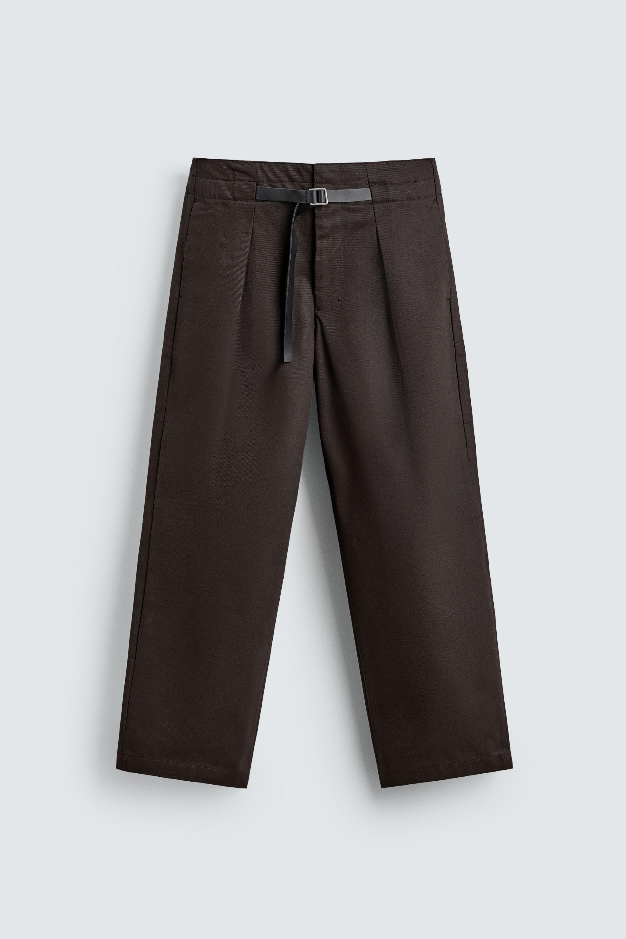 PANTALON À PLIS ET CEINTURE