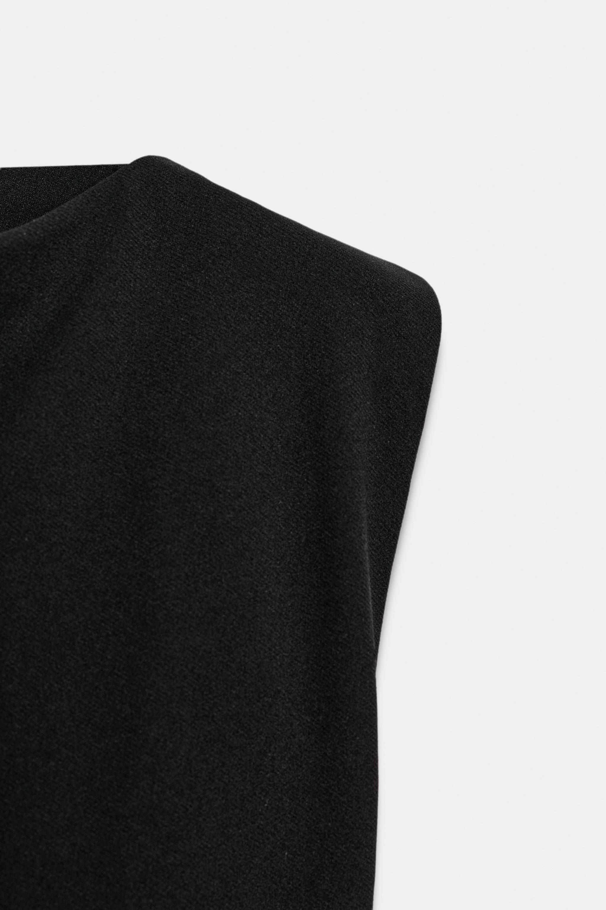 CREPE PEPLUM SHOULDER PAD TOP