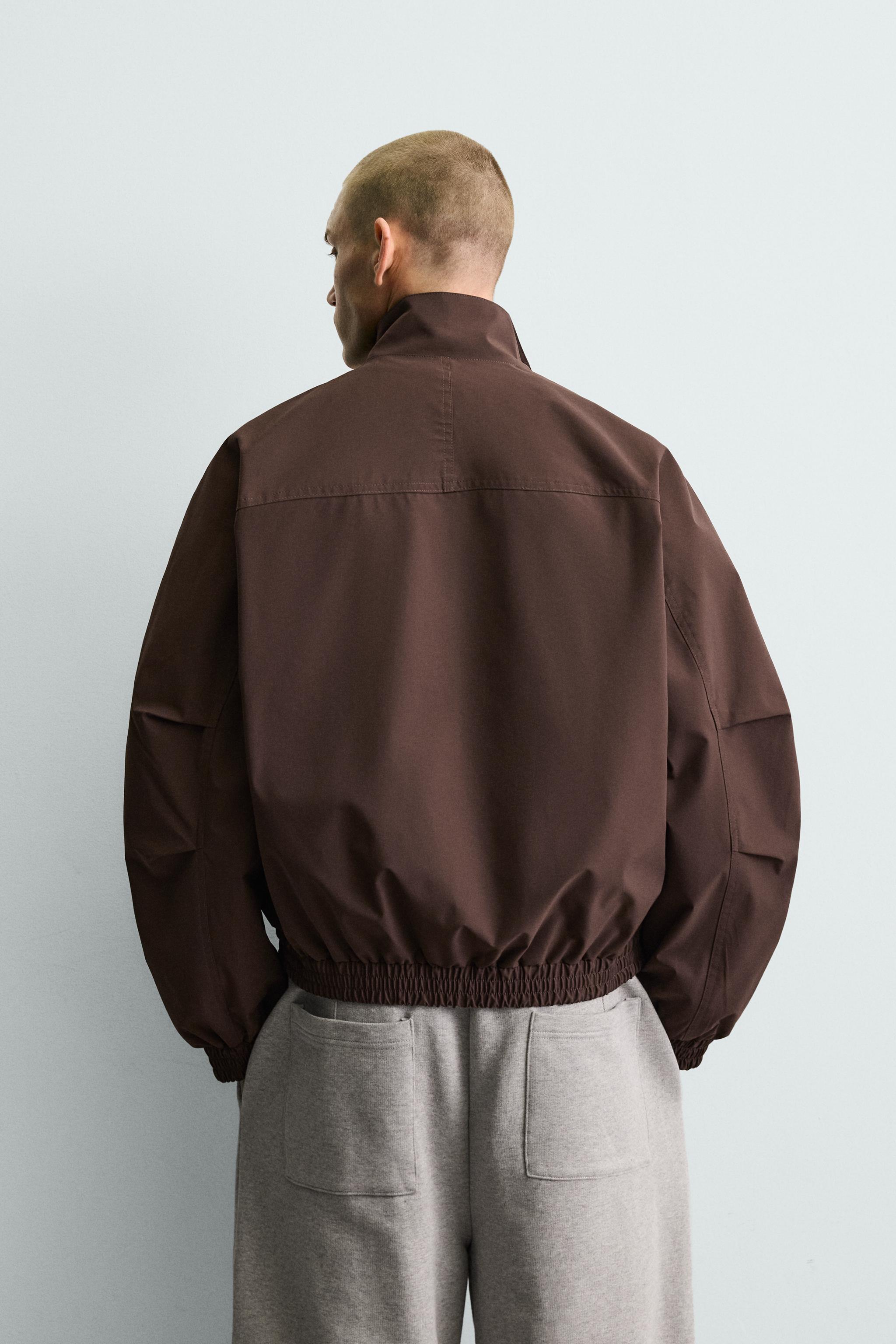 BLOUSON TECHNIQUE COUPE BOXY DÉPERLANT
