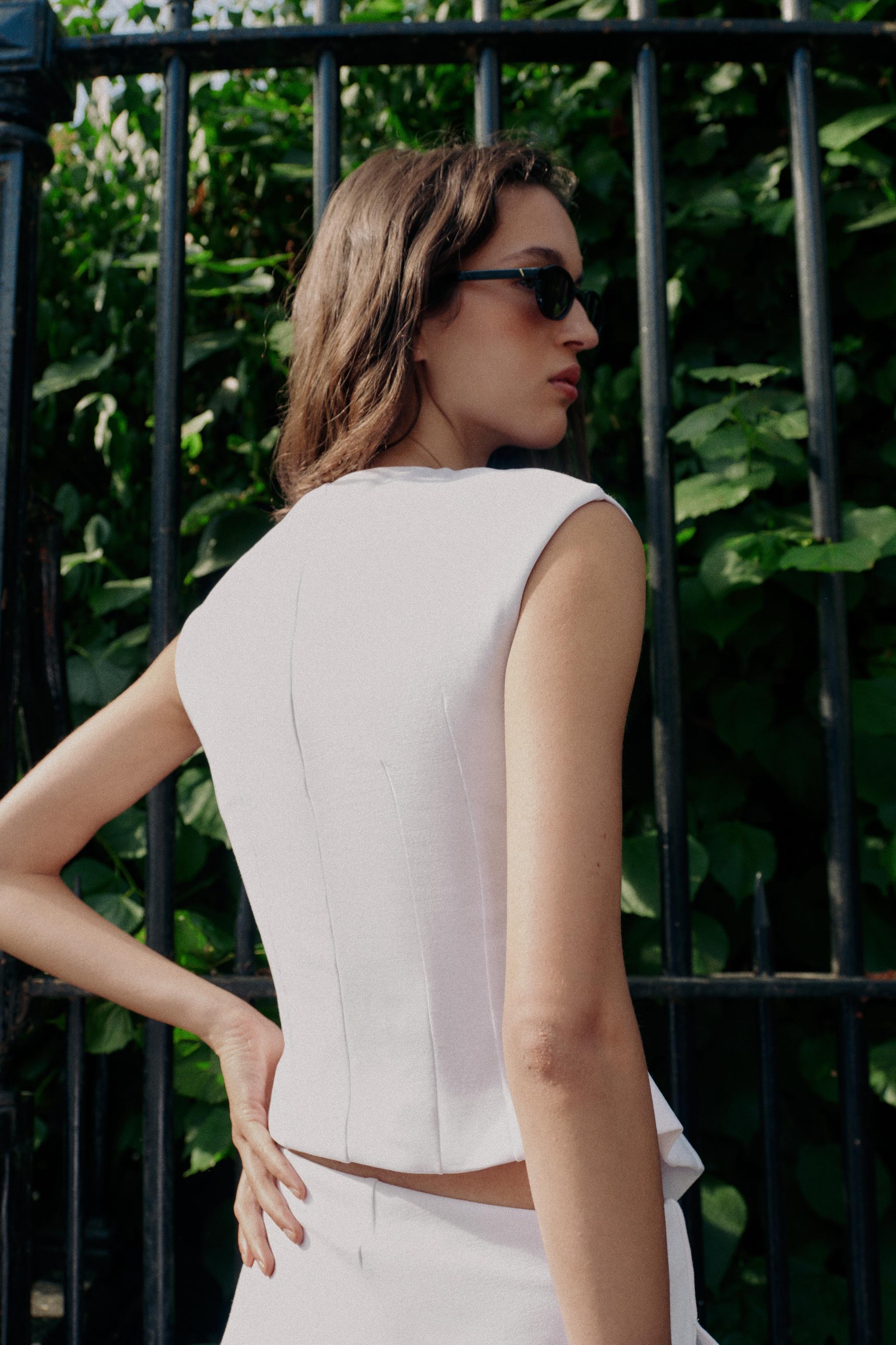 GILET INTERLOCK À BOUTONS