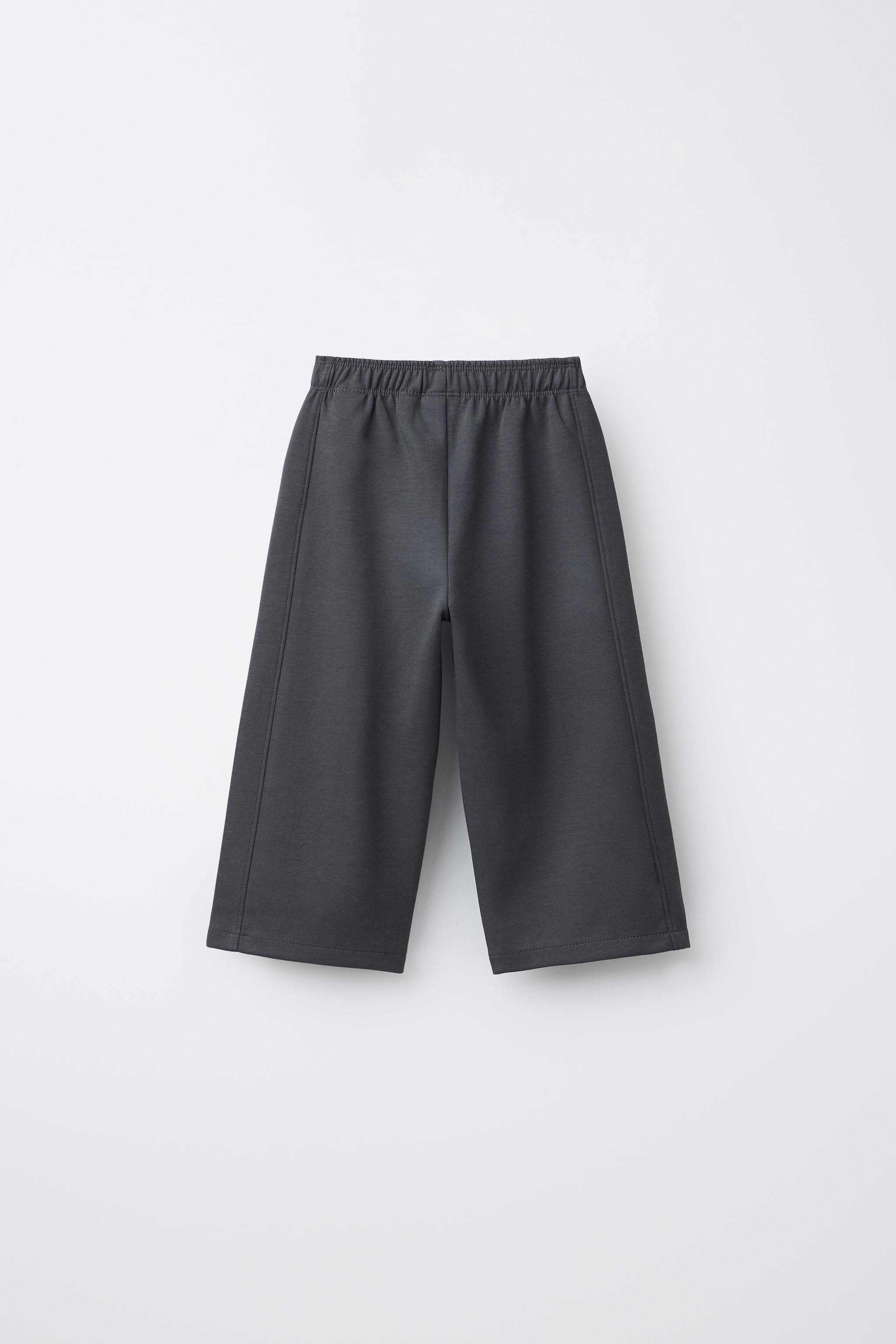 PANTALON WIDE LEG INTERLOCK INSCRIPTION EN RELIEF