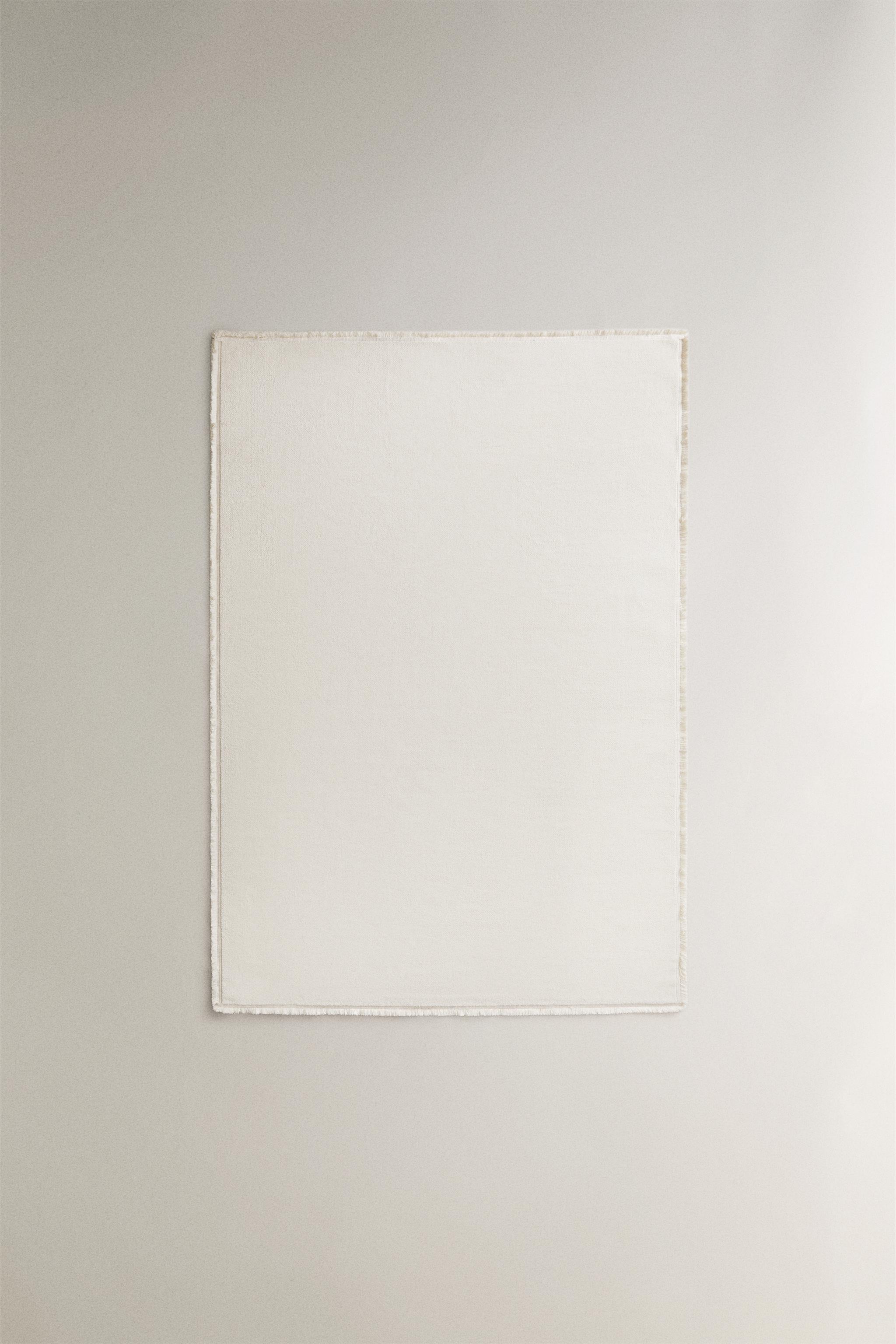TAPIS FRANGES