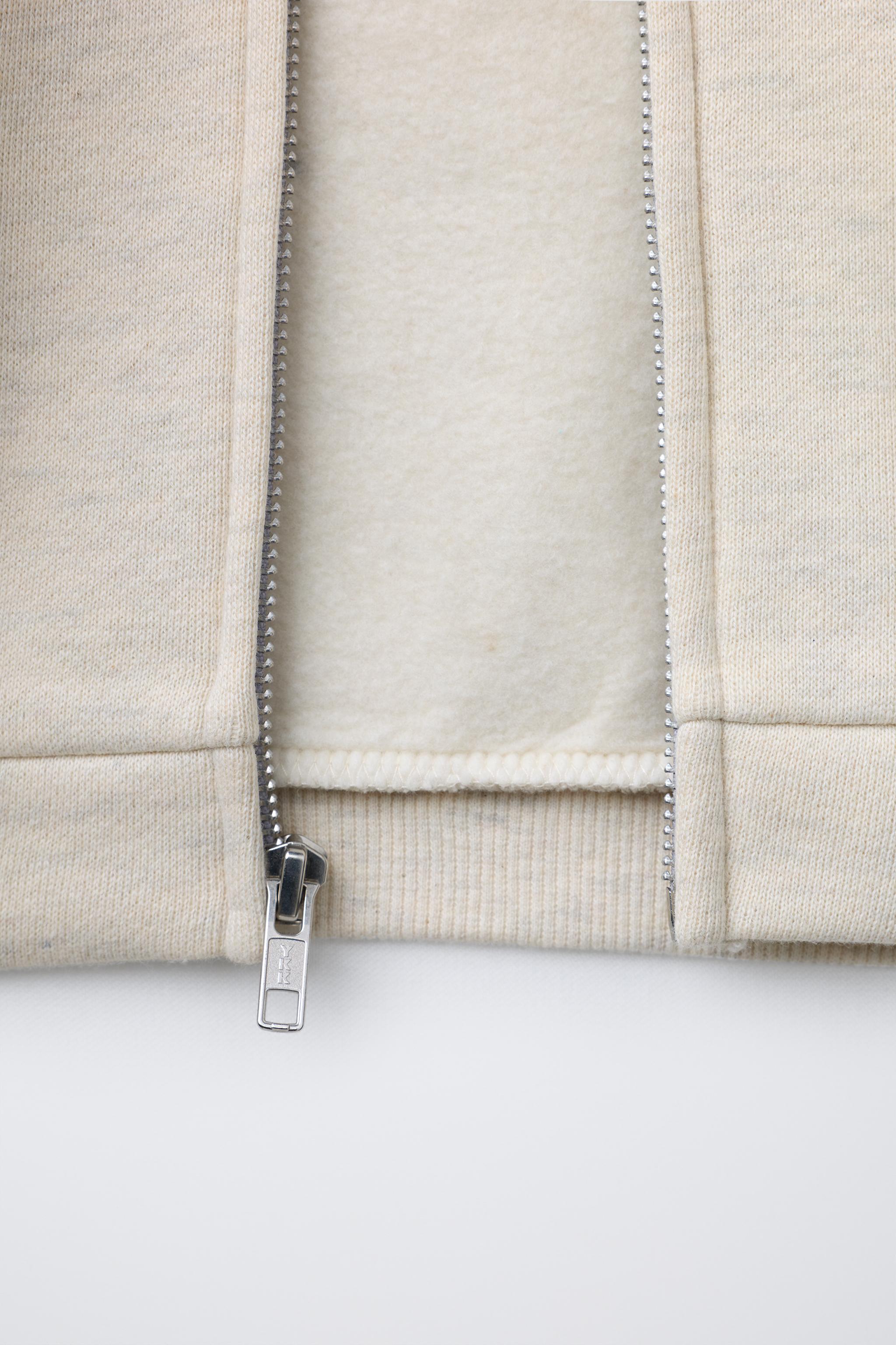EMBOSSED LOGO ZIP-UP HOODIE