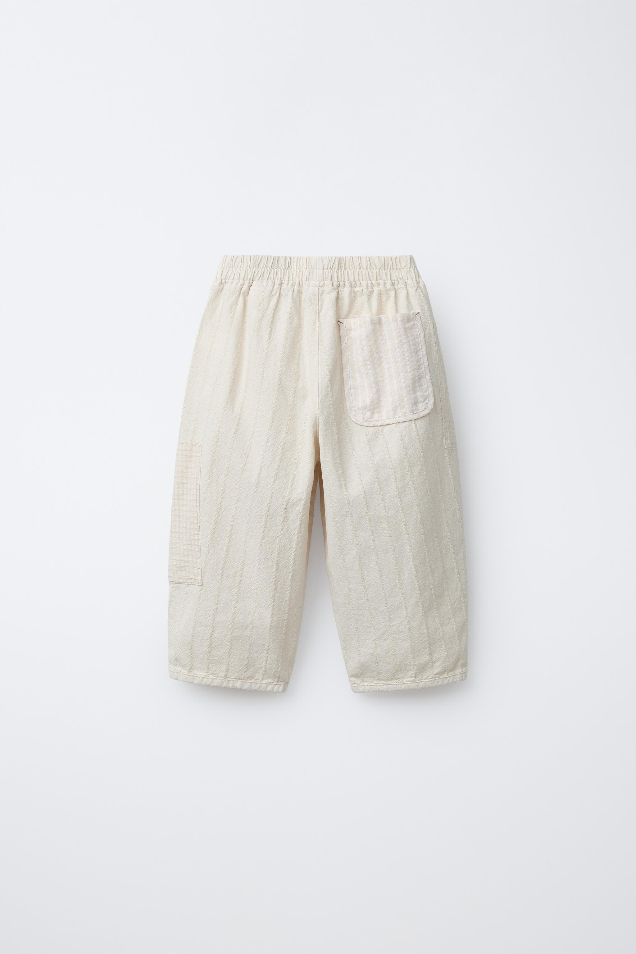 PANTALON BAGGY RUSTIQUE AVEC PIÈCES