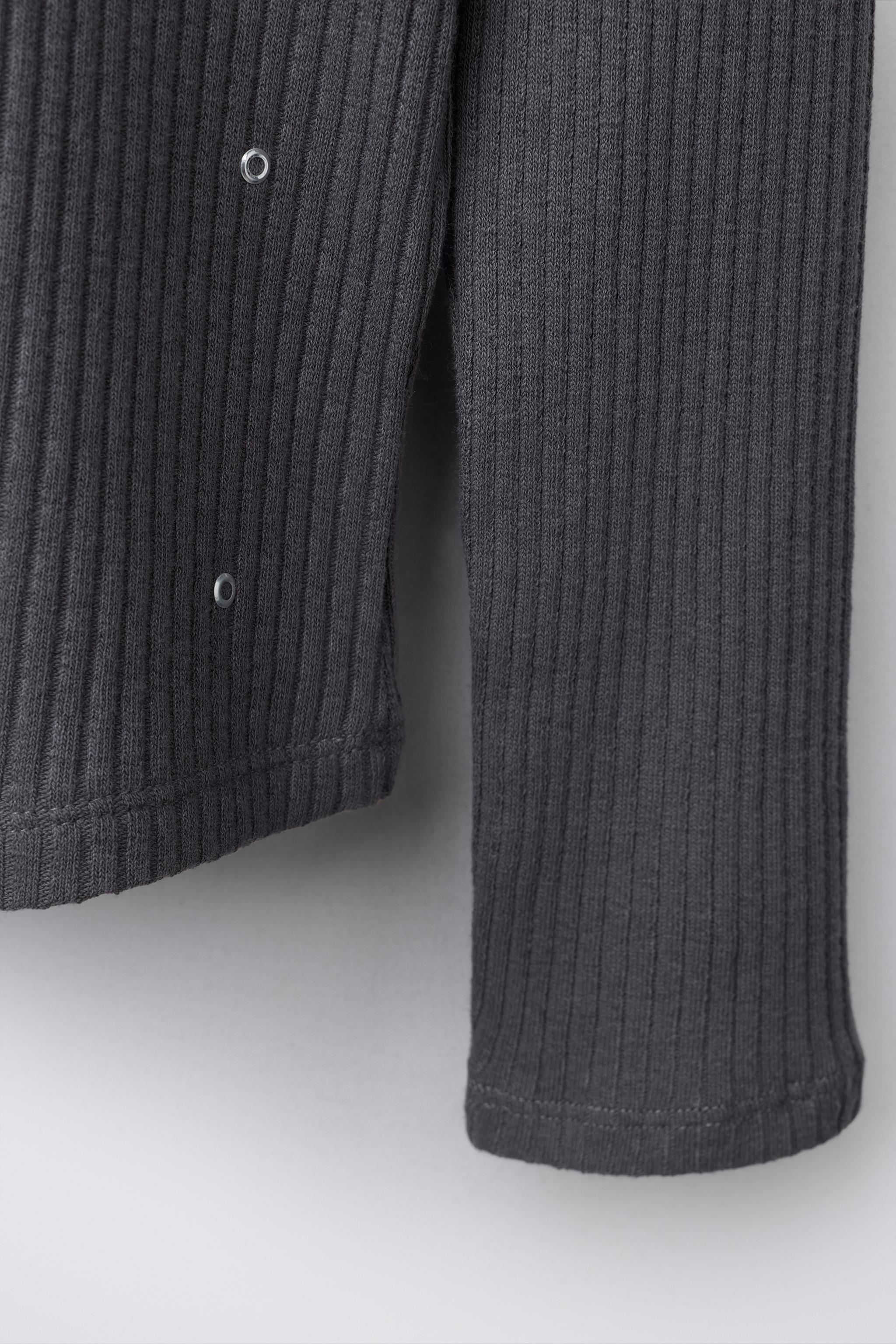 RIBBED TURTLENECK T-SHIRT WITH STUDS