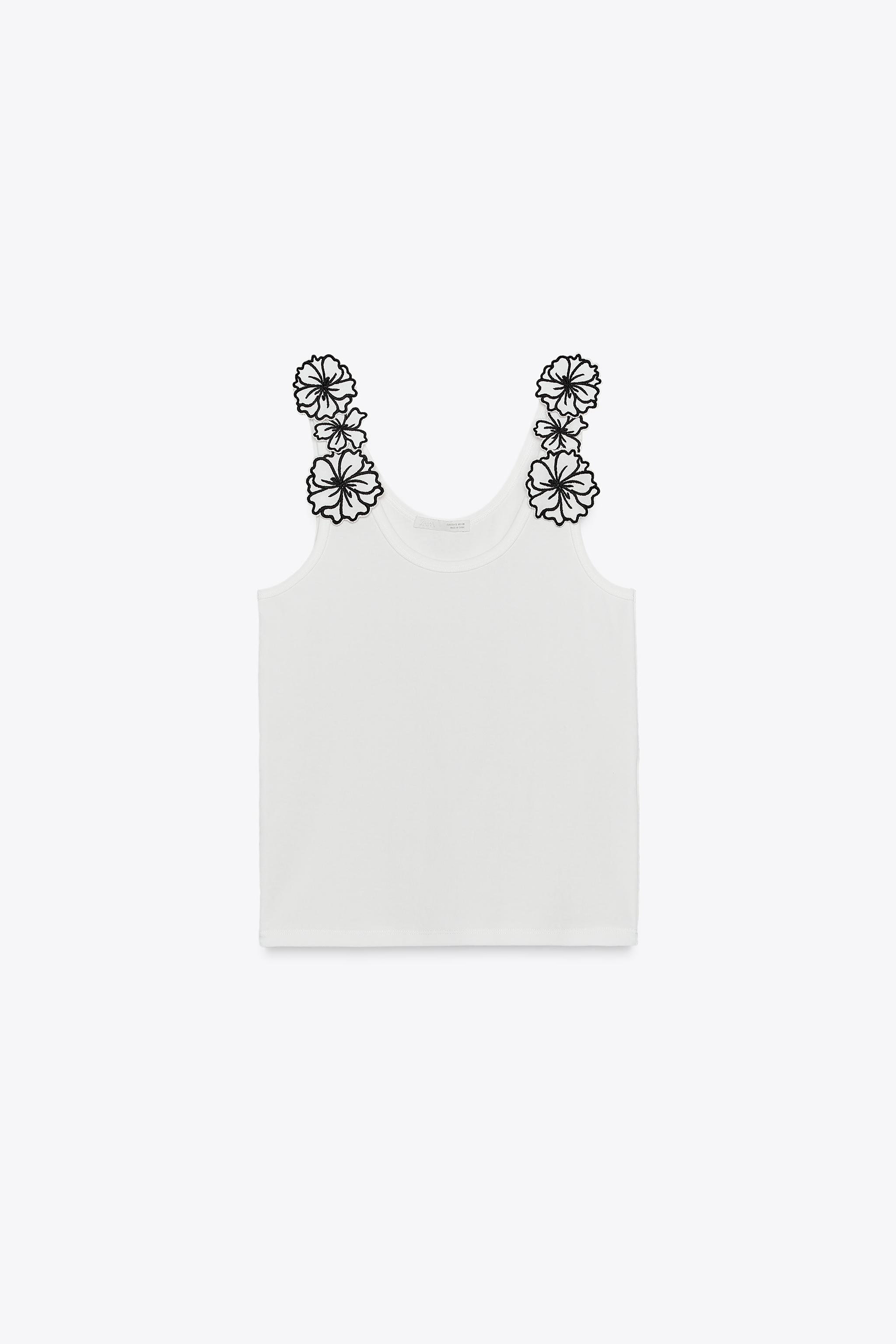 TOP AVEC APPLIQUES FLEURS