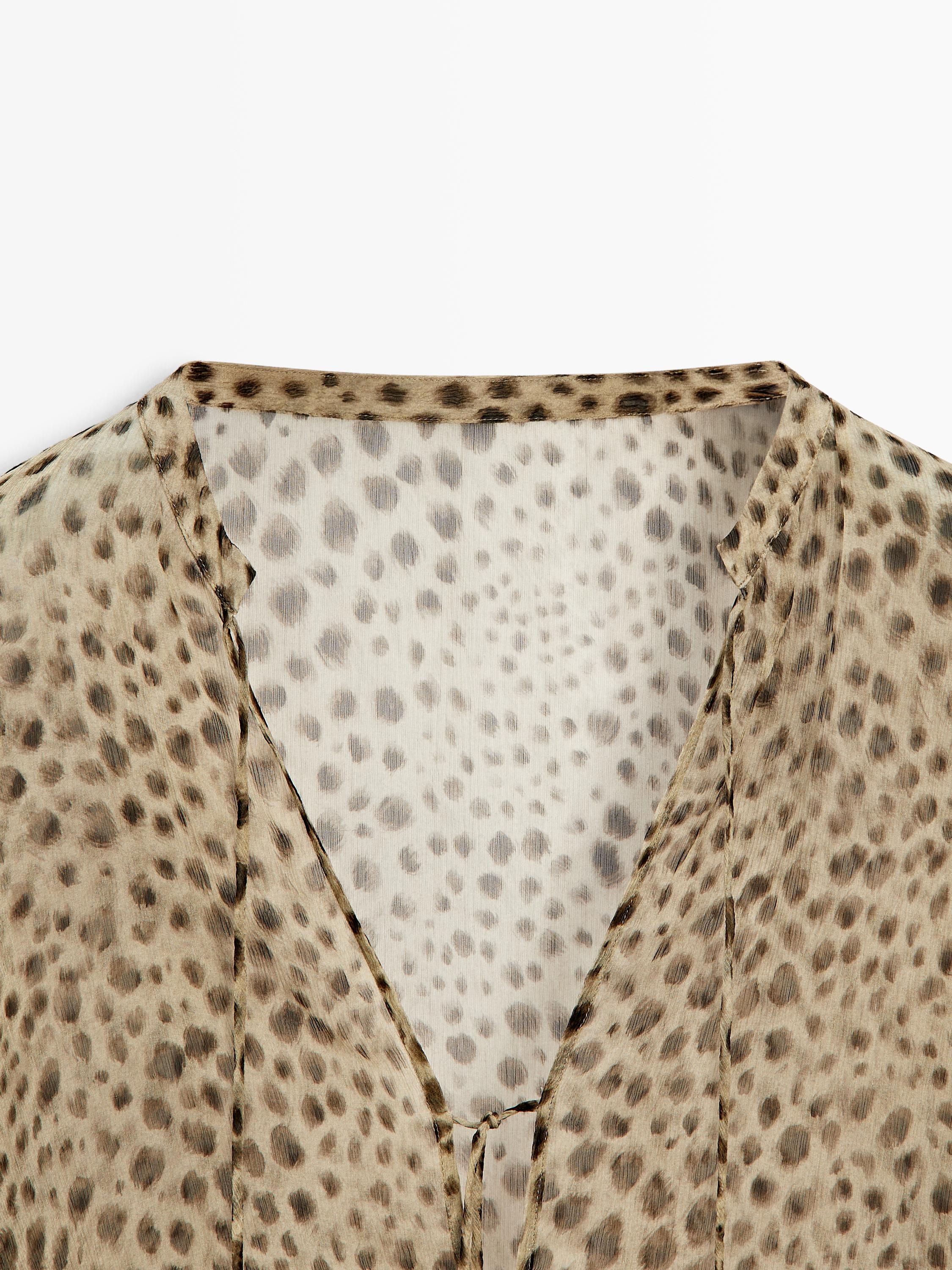 Flowing animal print blouse