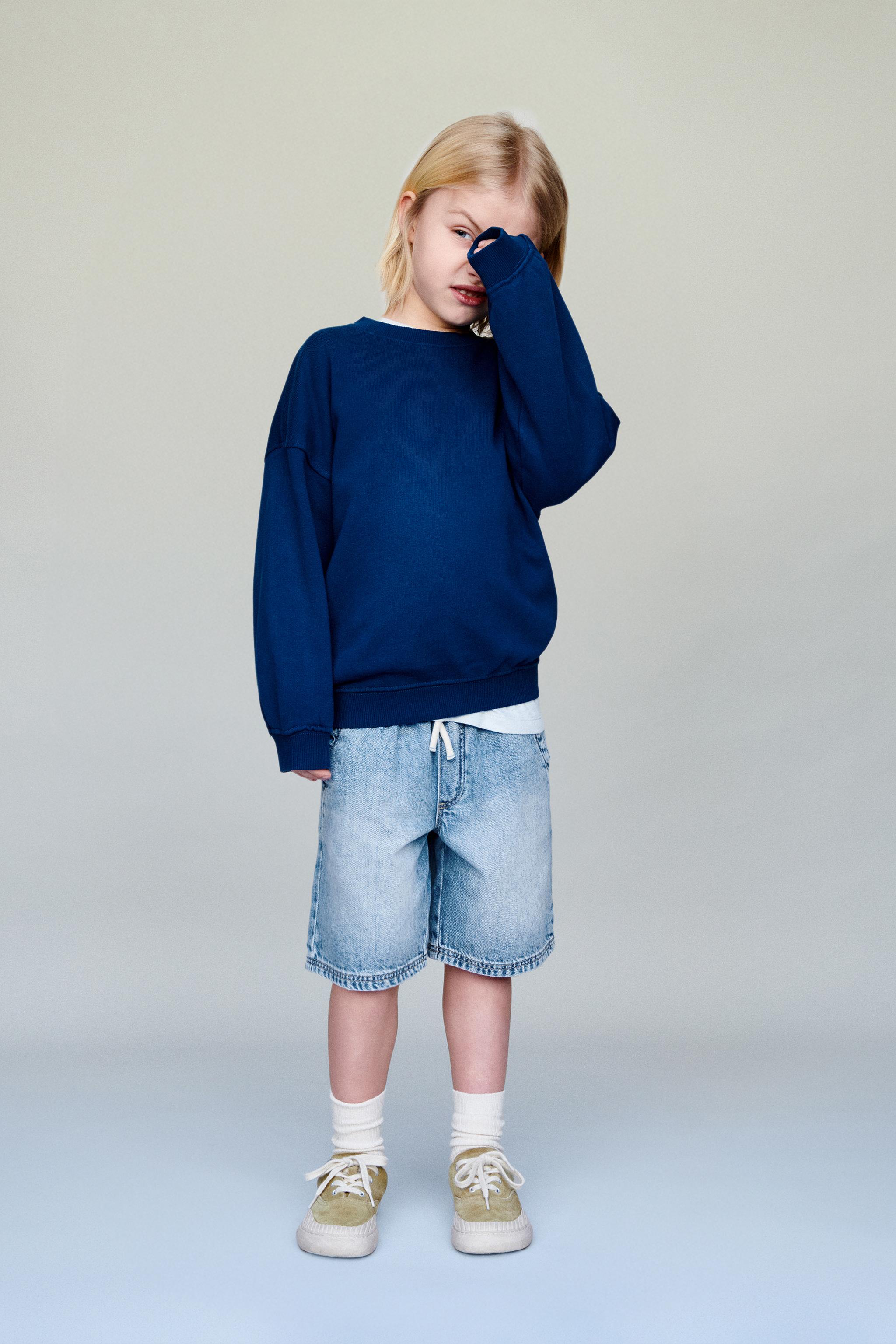 DENIM SHORTS WITH LABEL — Mid-blue