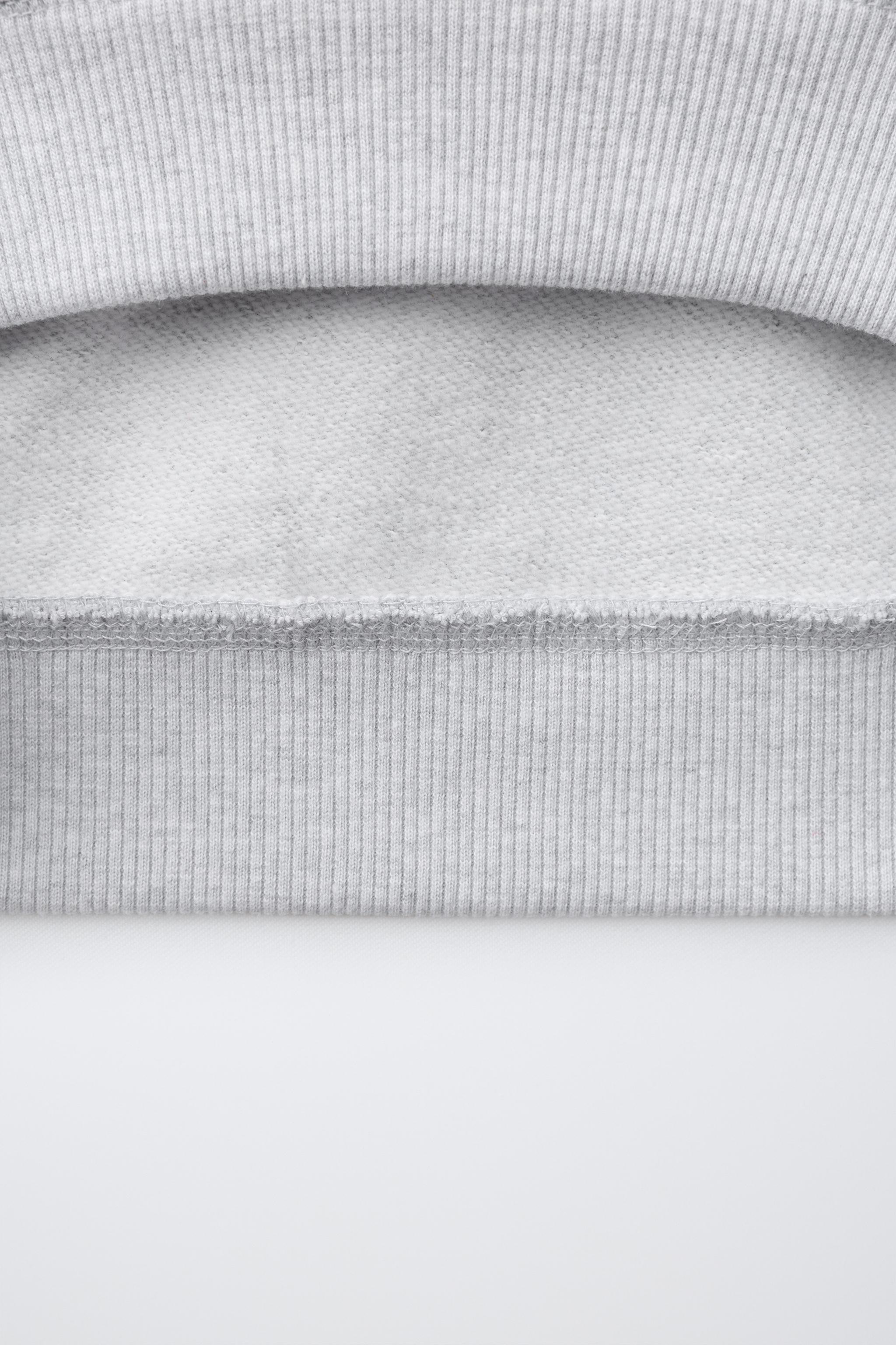 SWEAT À CAPUCHE BRODÉ FRUIT OF THE LOOM™