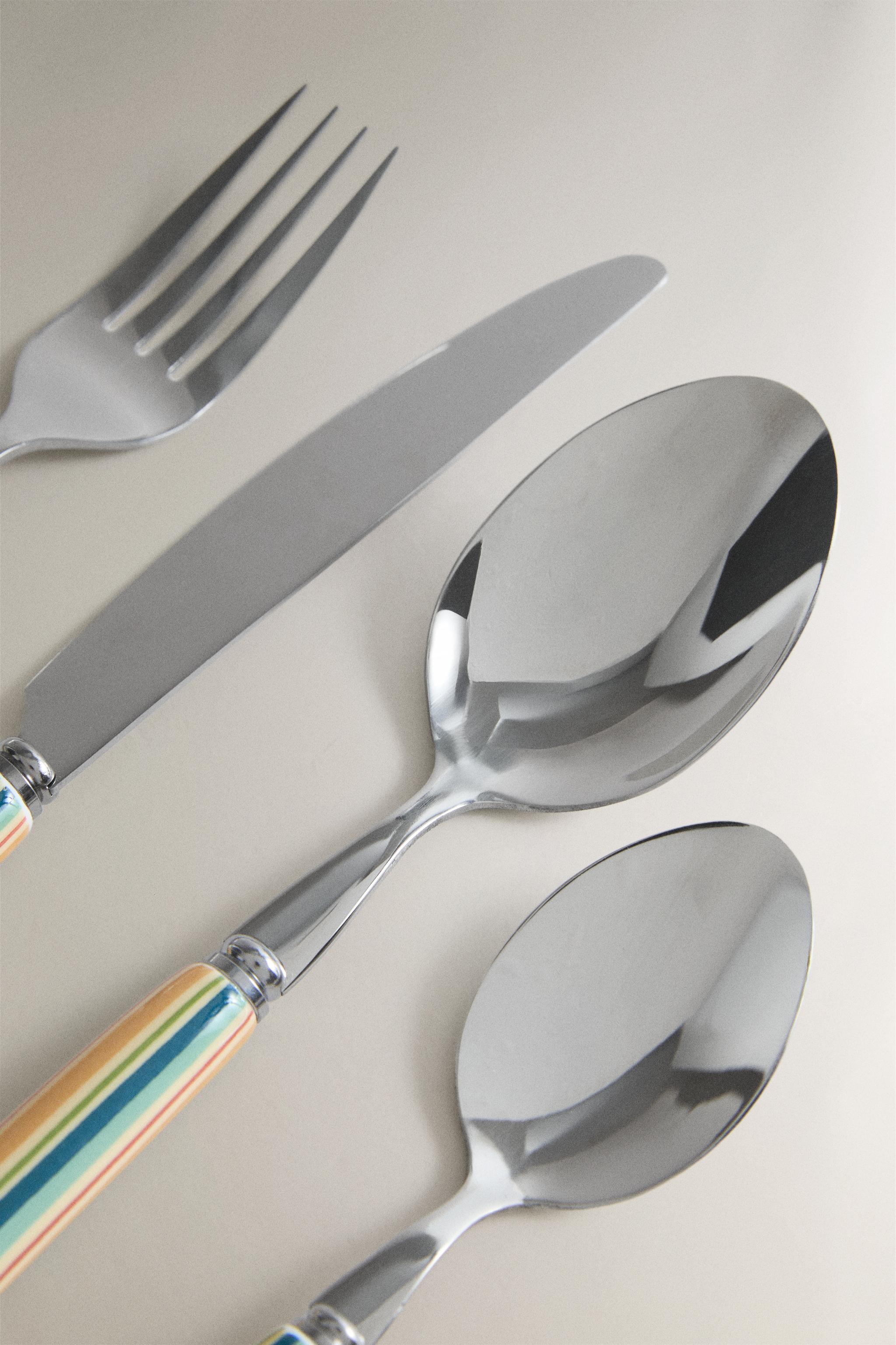 ENSEMBLE COUVERTS MANCHE CÉRAMIQUE (LOT DE 4)