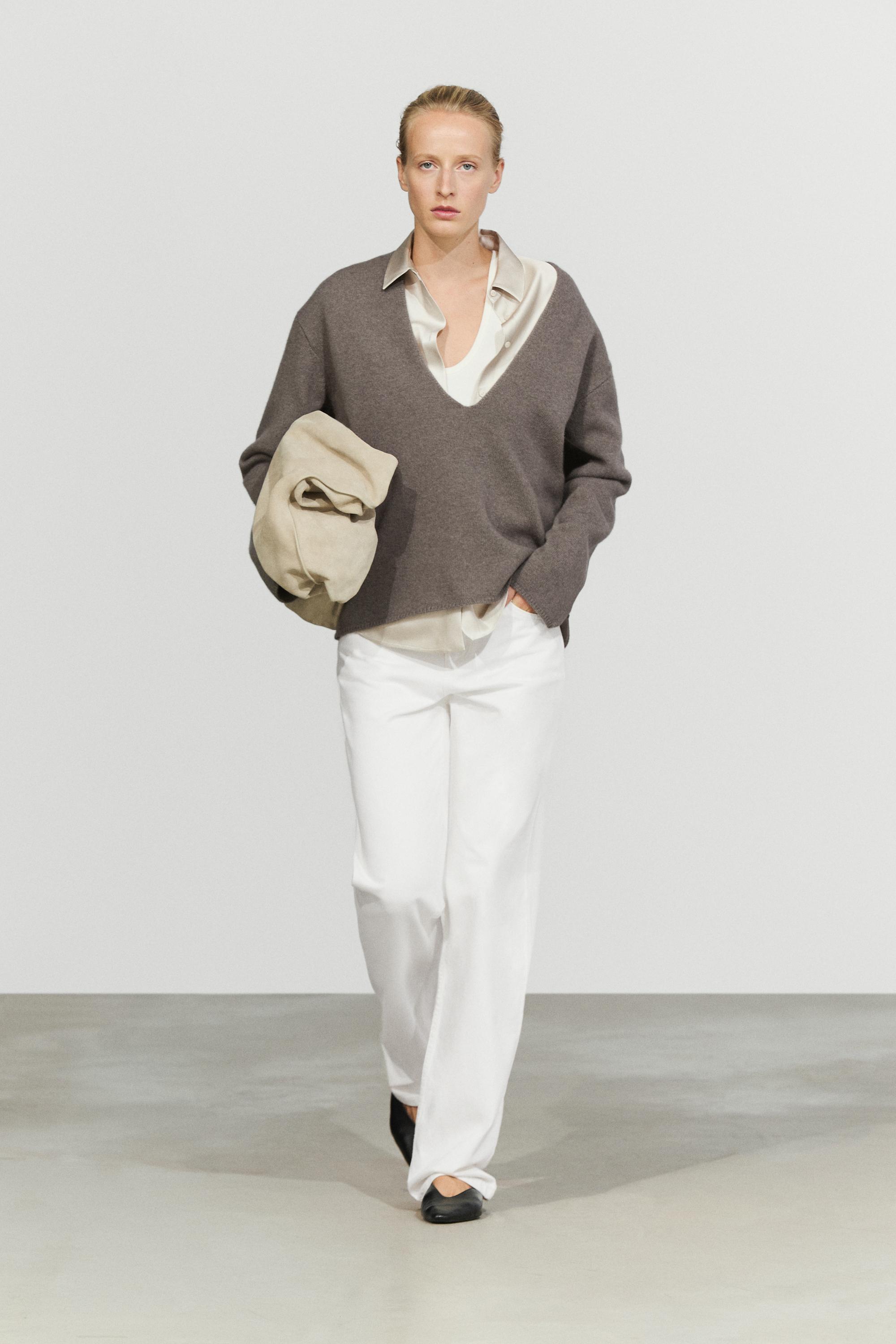 Long-line knit sweater with neckline detail — 211