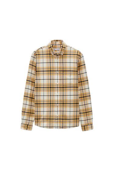 Yellow and black plaid shirt with a white background, long sleeves and a classic collar, on a white background.