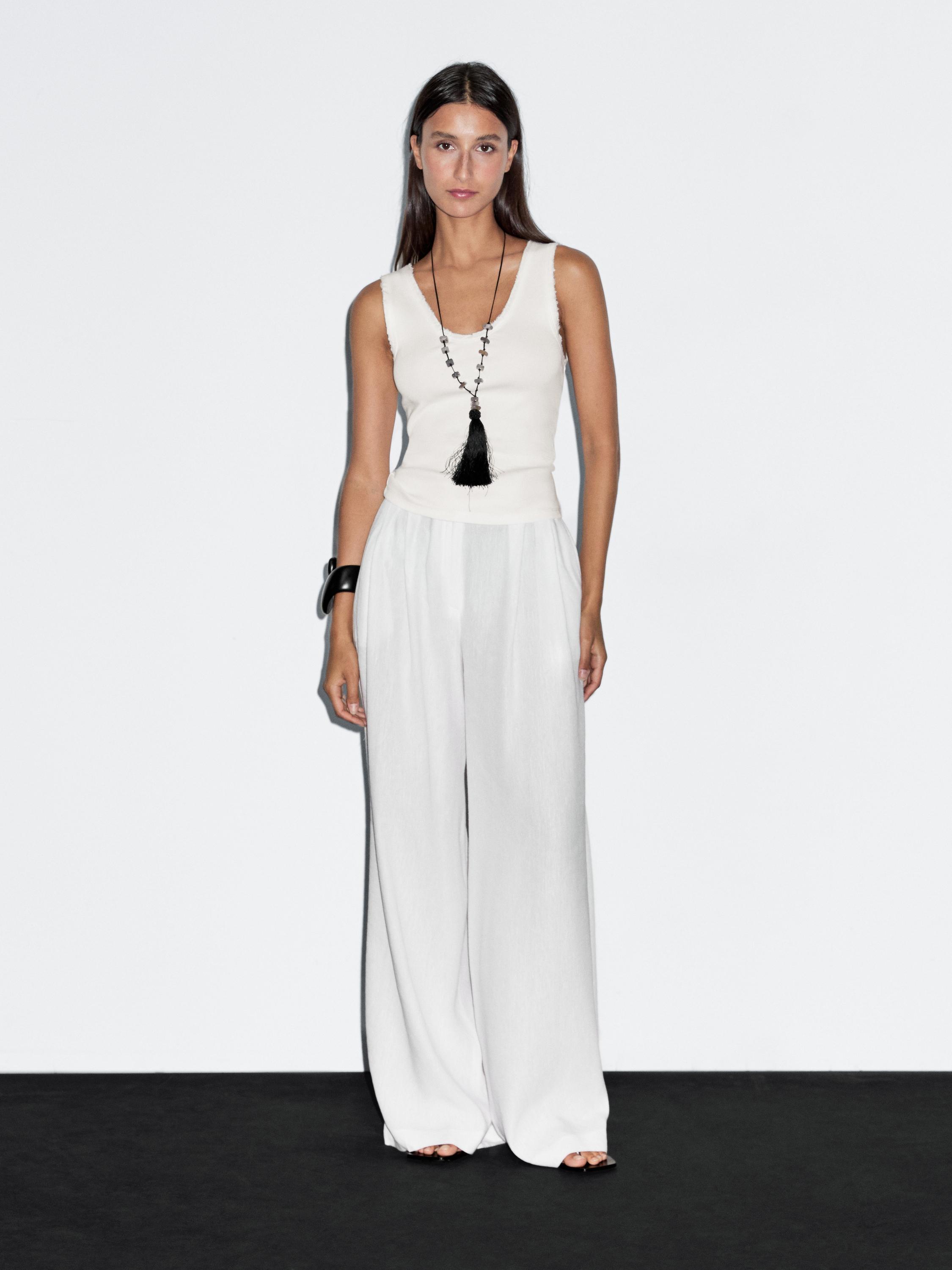 Cotton blend top with frayed piping