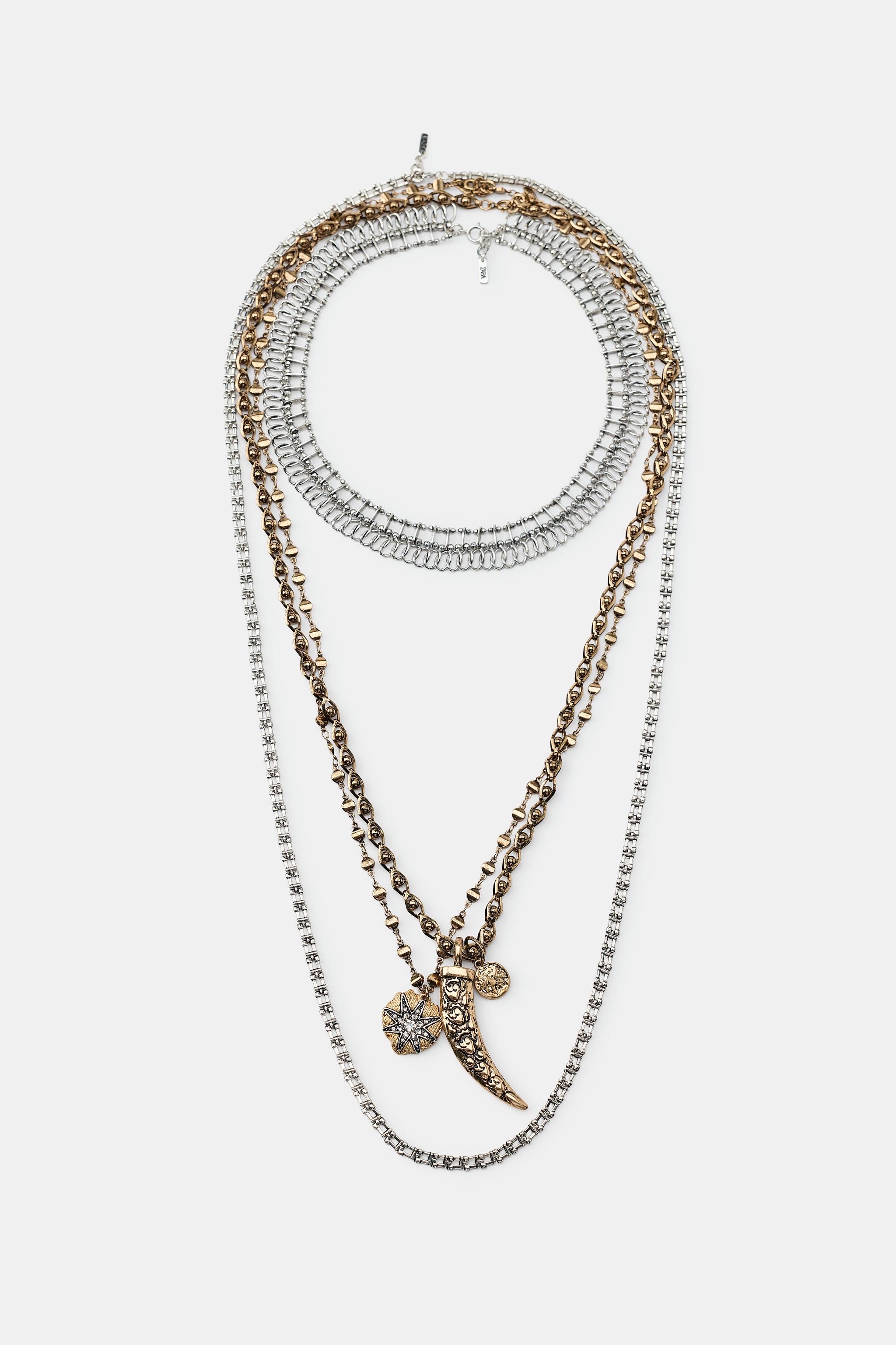 SET OF 4 MIXED HORN AND STAR NECKLACES