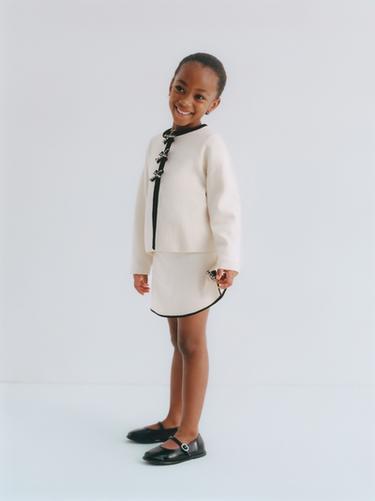 KNIT SKIRT WITH CONTRAST BOWS - Ecru by Zara