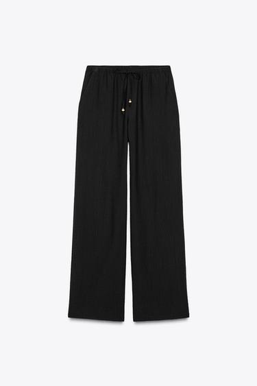 WIDE-LEG TROUSERS WITH ELASTIC WAISTBAND - Black by Zara - Image 0