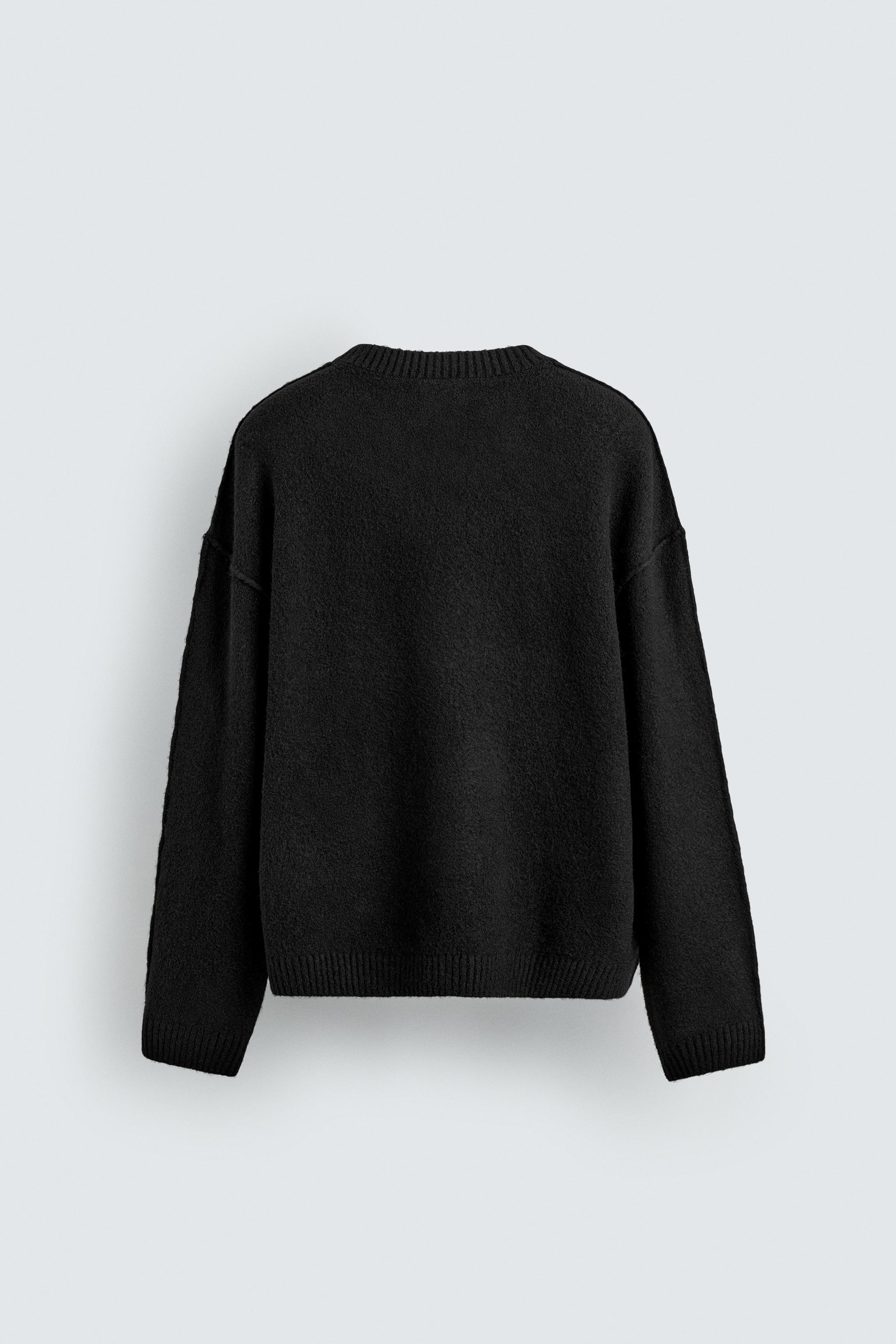 TEXTURED SWEATER WITH REVERSE EFFECT SEAMS