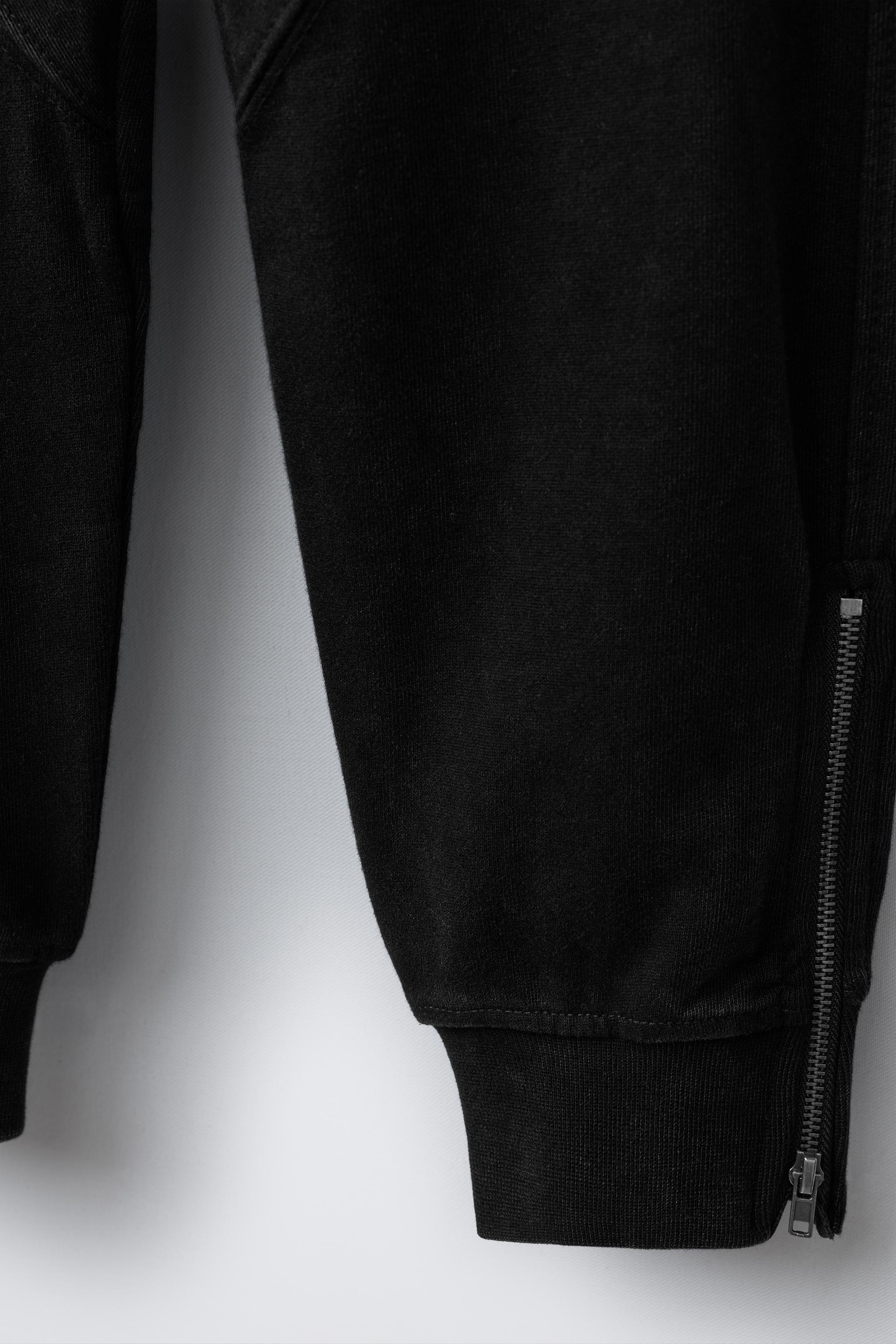 PANTALON JOGGER ZIPPÉ