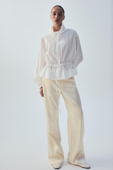 PANTALÓN SATINADO CONTRASTE - Beige de Zara