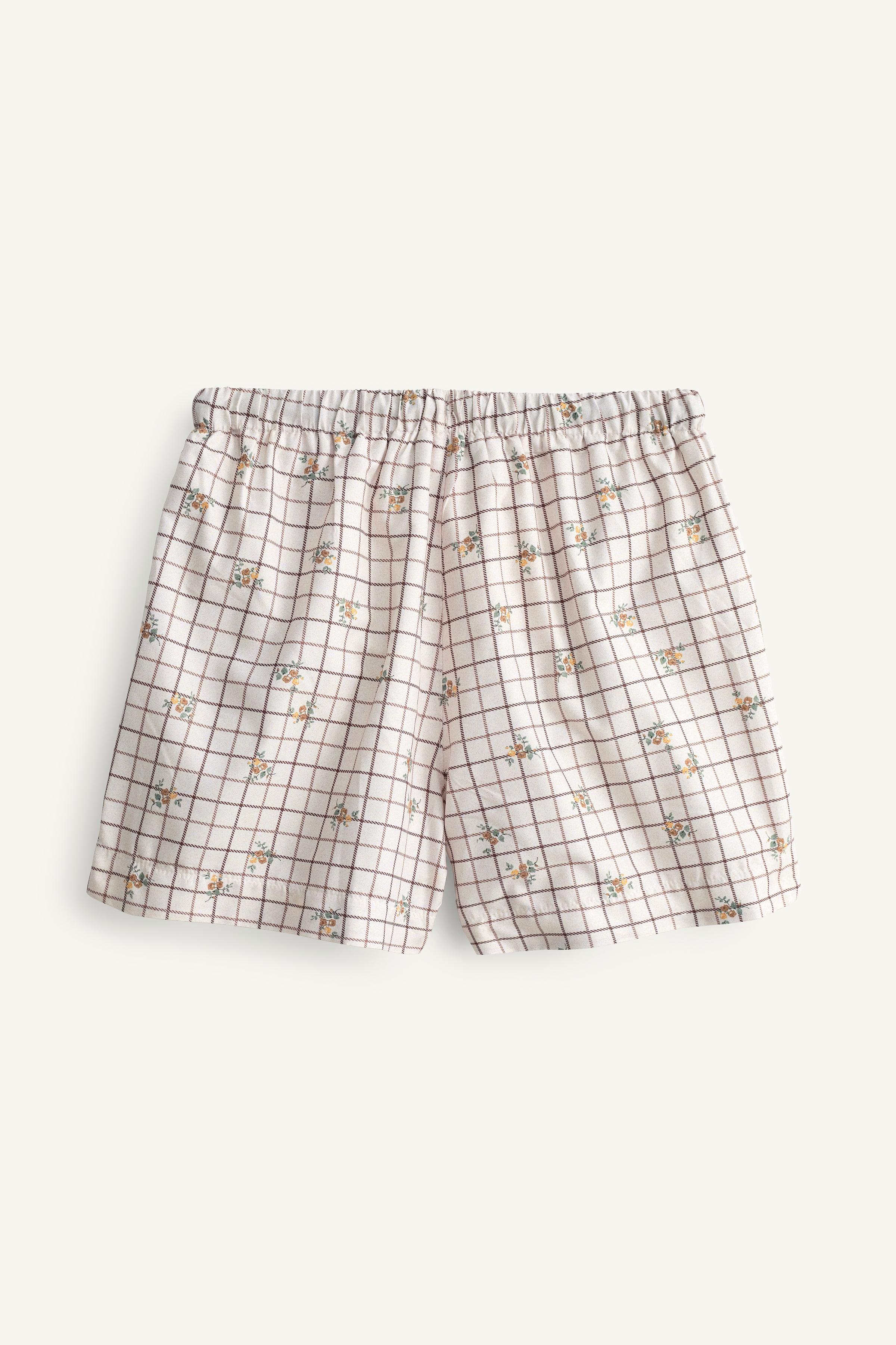 SHORT DE BAIN À CARREAUX ET FLEURS ÉDITION LIMITÉE