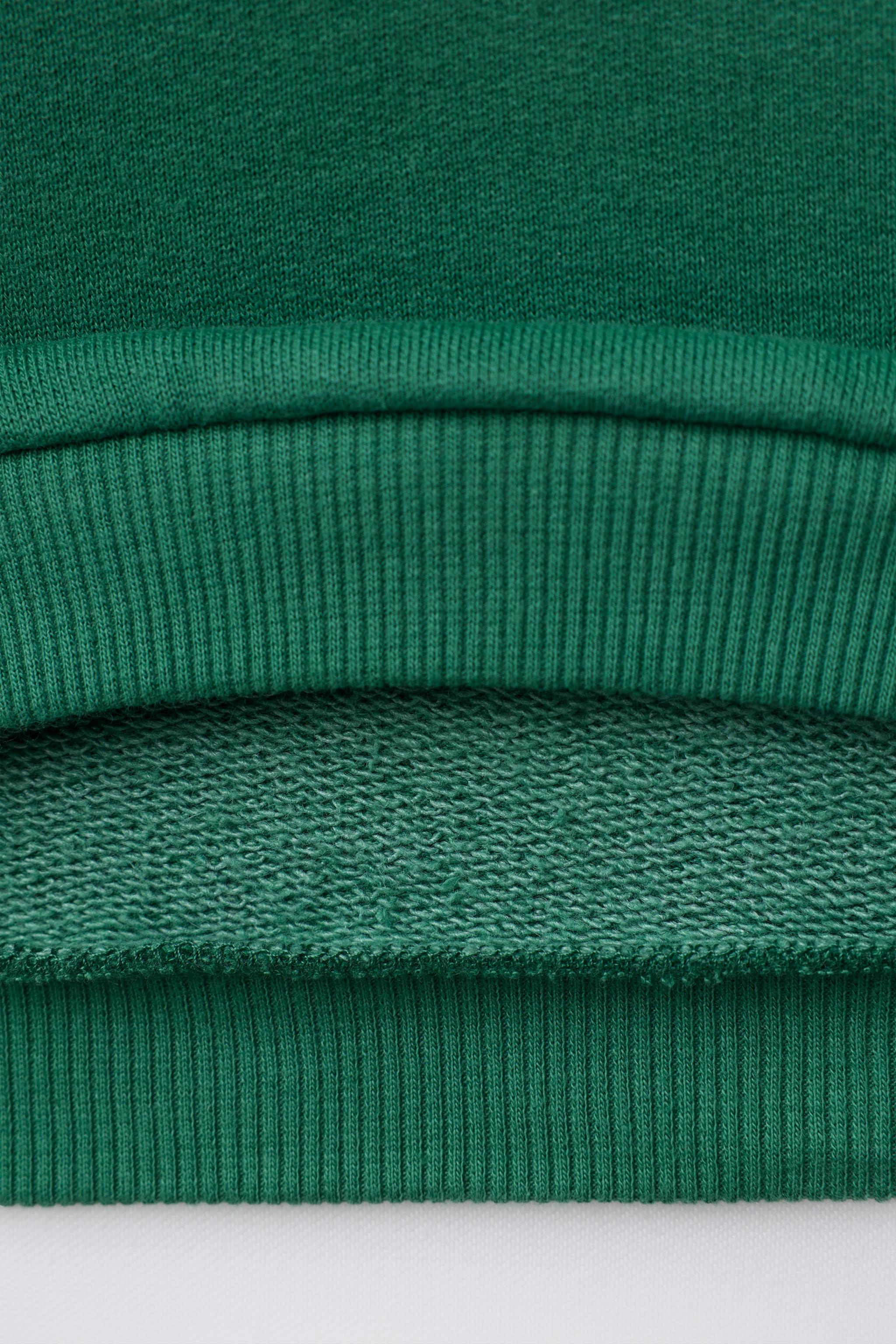 TEXT AND CLOVER PRINT SWEATSHIRT