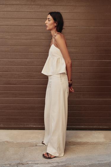 TOP HALTER DENIM ABALORIOS - Crudo de Zara