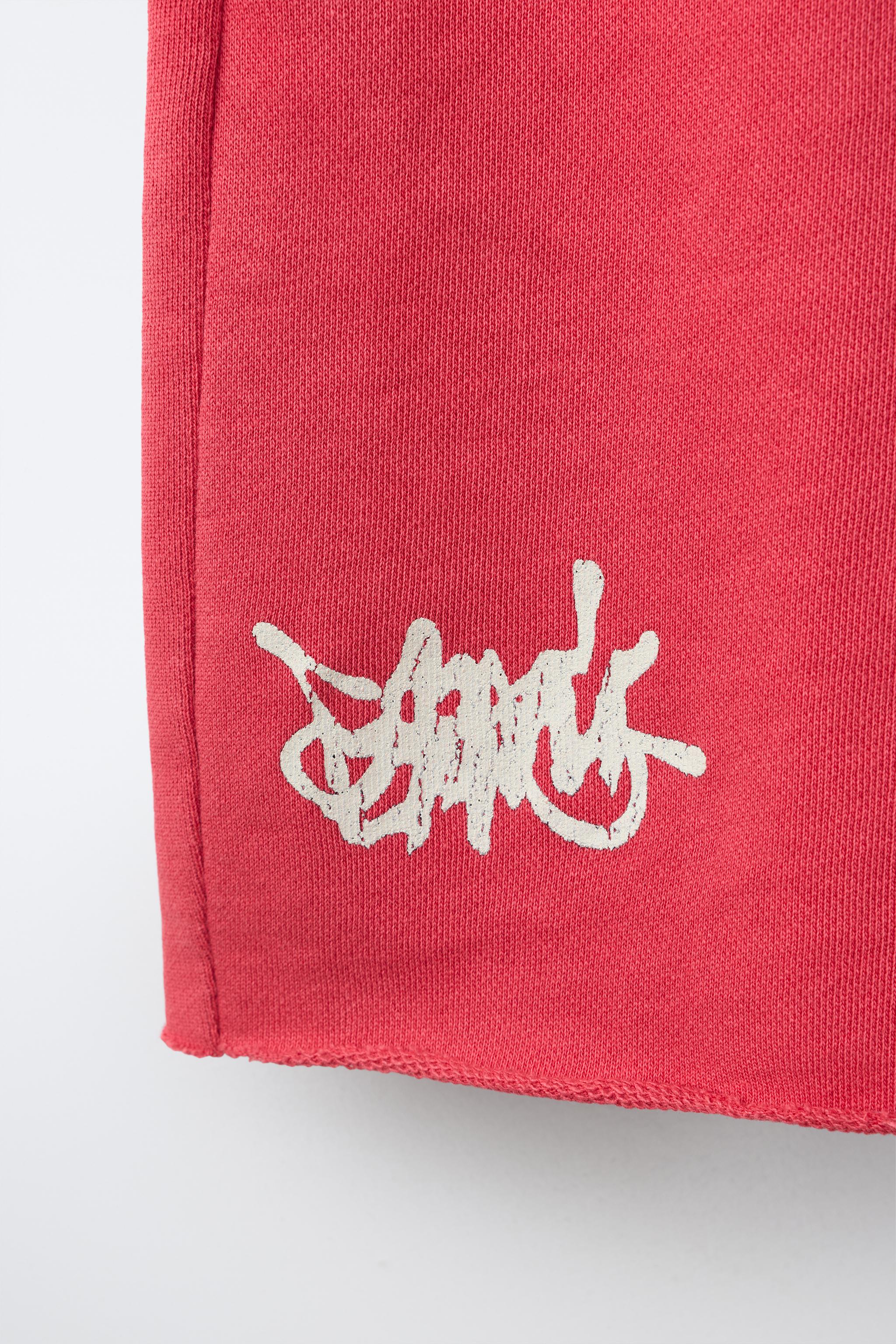 Детские шорты Zara PLUSH NUMBER AND GRAFFITI SHORTS — фото 5