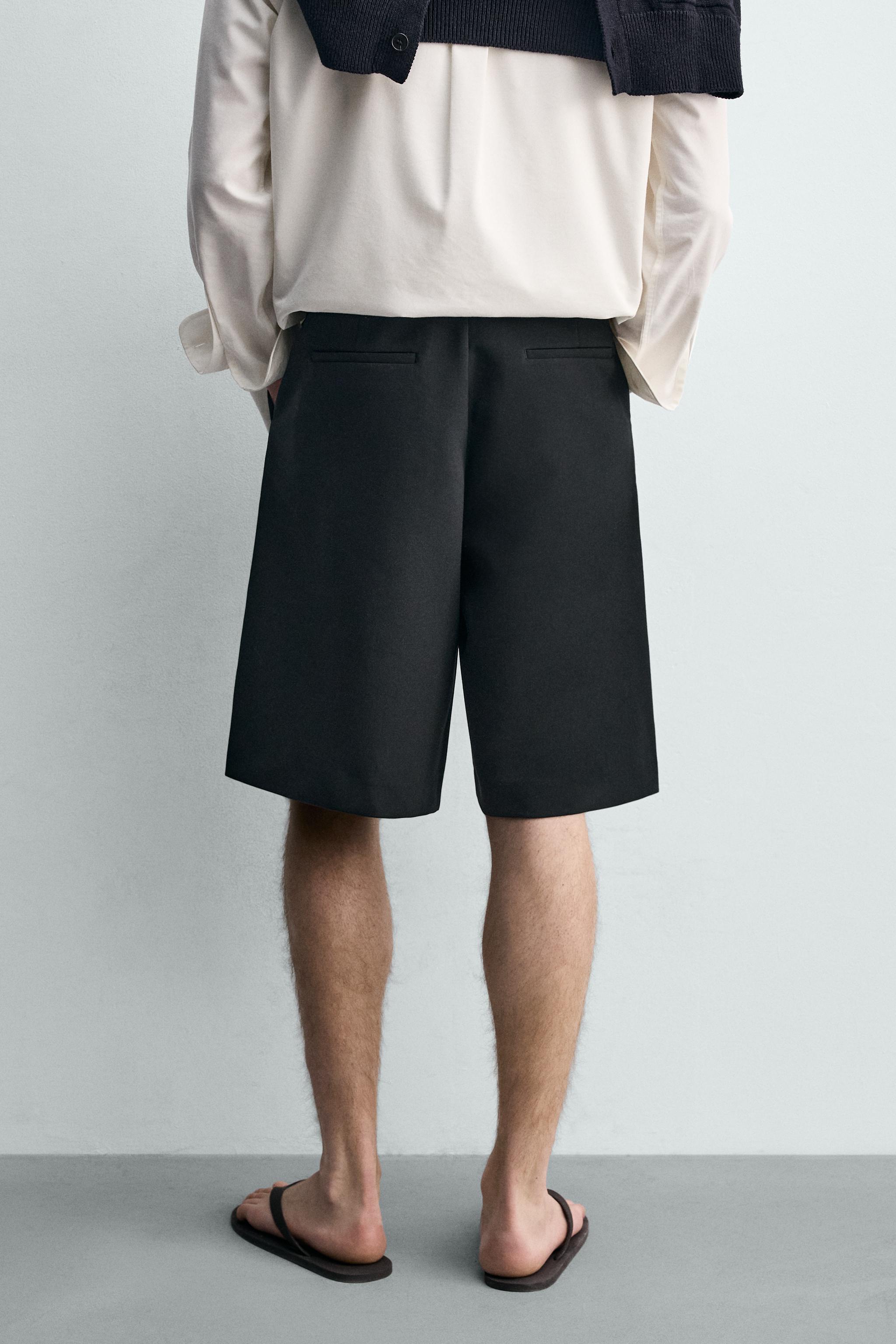 FLOWY PLEATED SHORTS