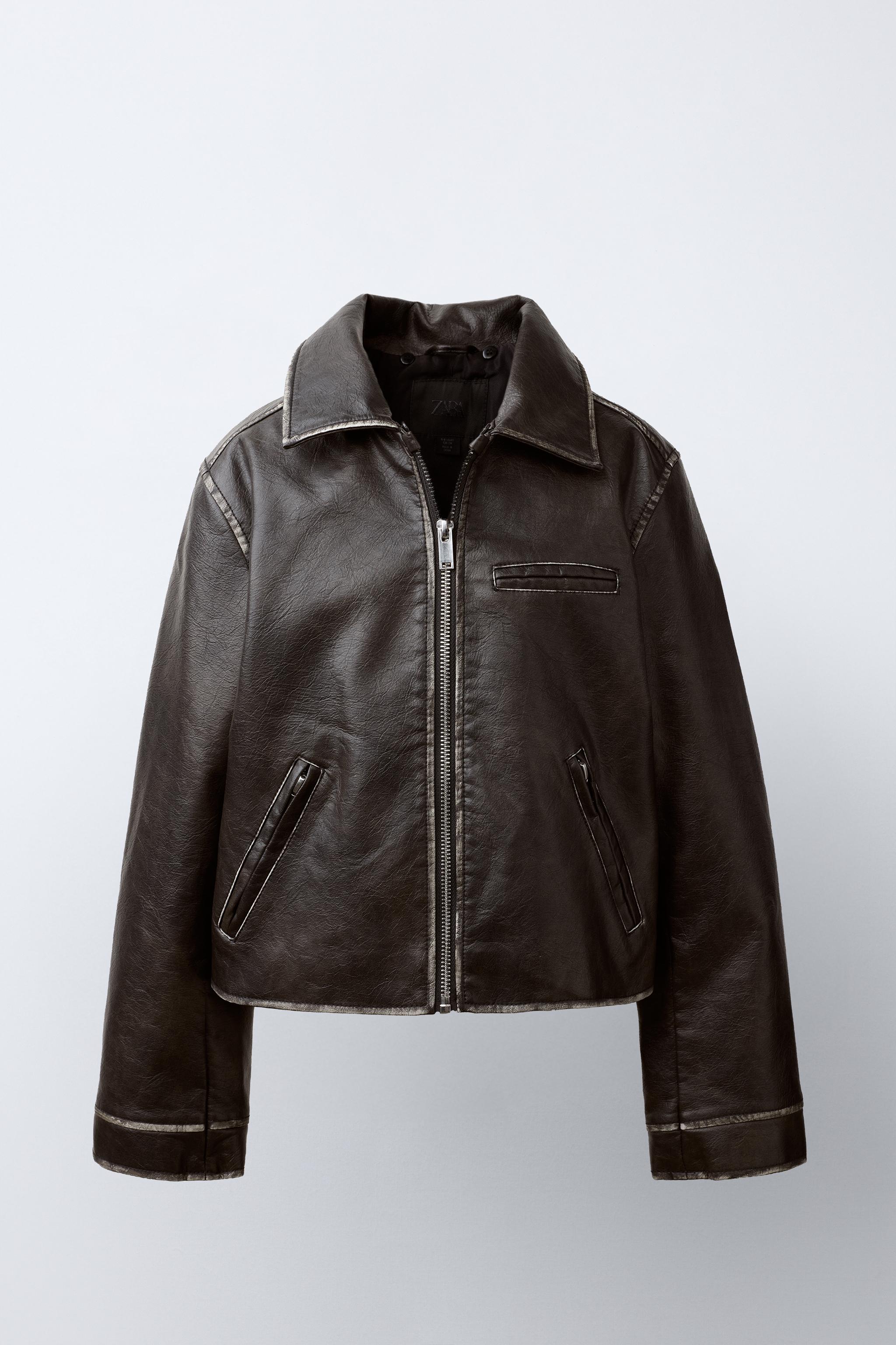 BLOUSON EN MATIÈRE SYNTHÈTIQUE USÉ À COL EFFET FOURRURE
