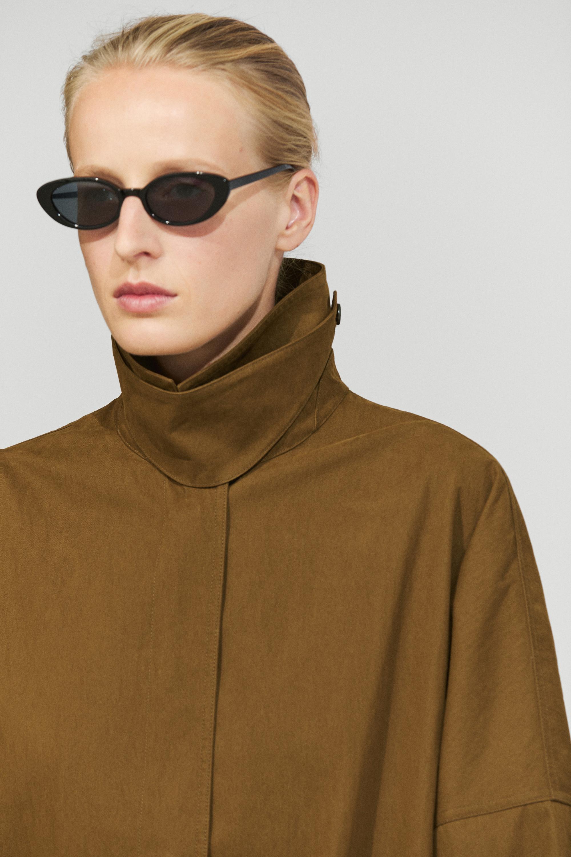 Button-tab cape jacket