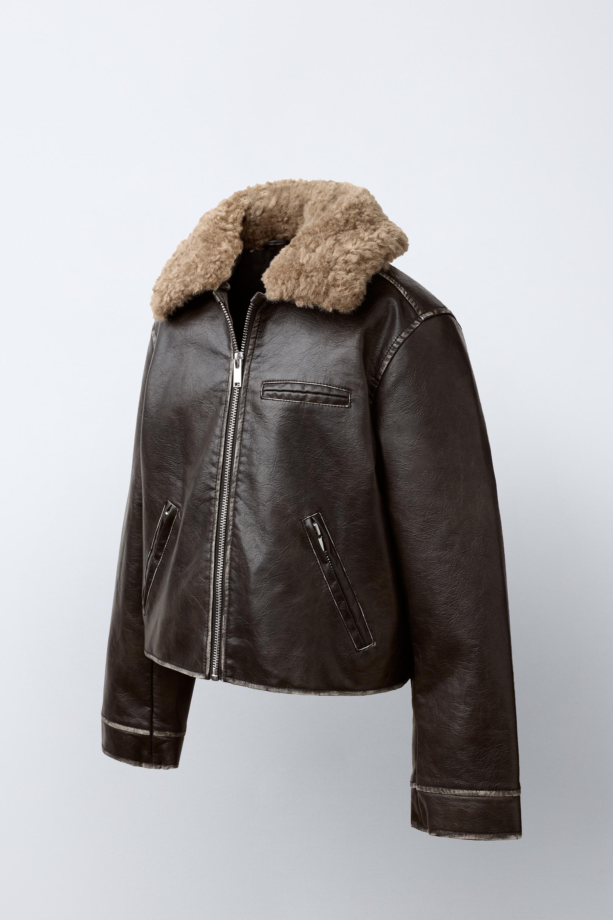 BLOUSON EN MATIÈRE SYNTHÈTIQUE USÉ À COL EFFET FOURRURE