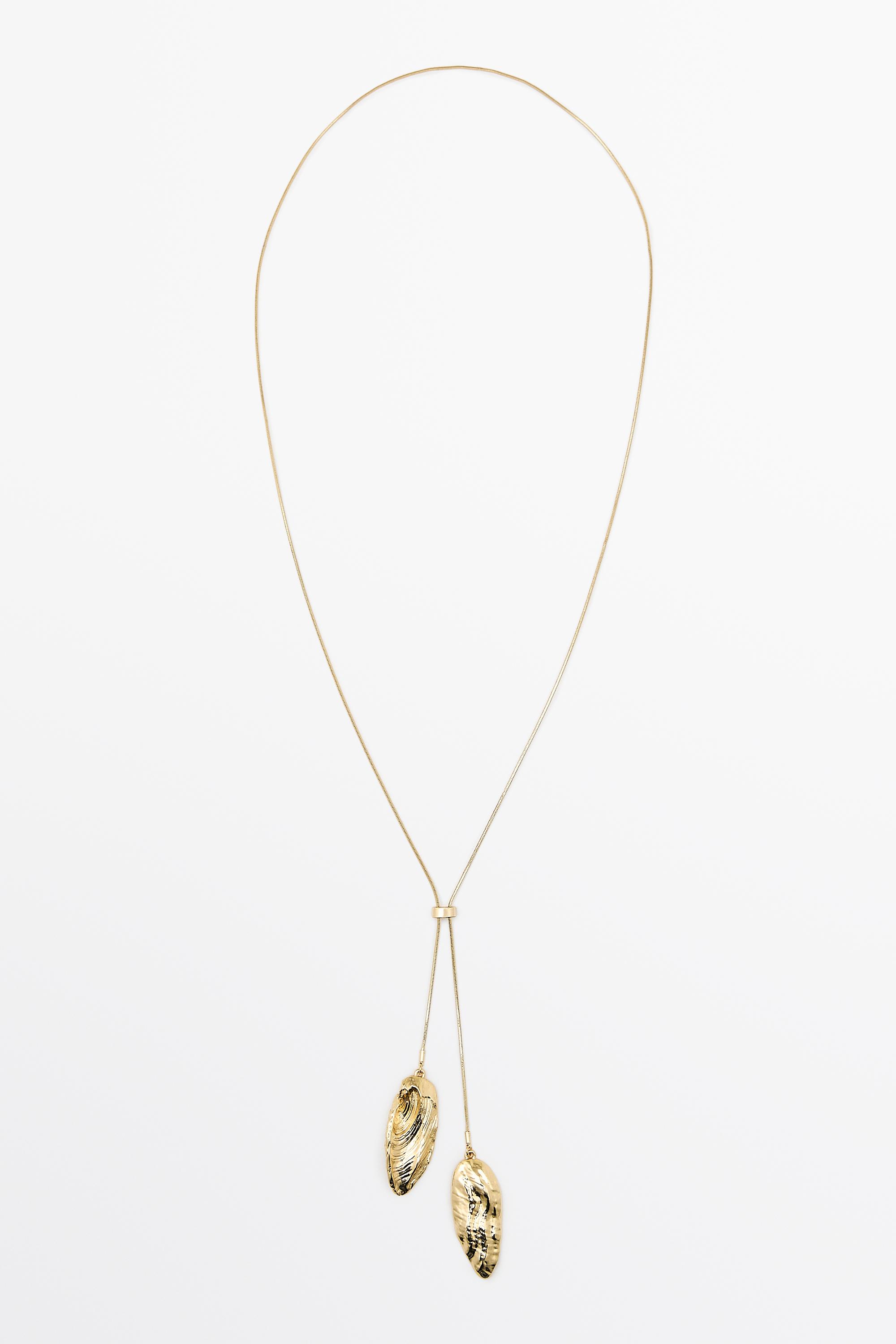 Adjustable necklace with textured pieces