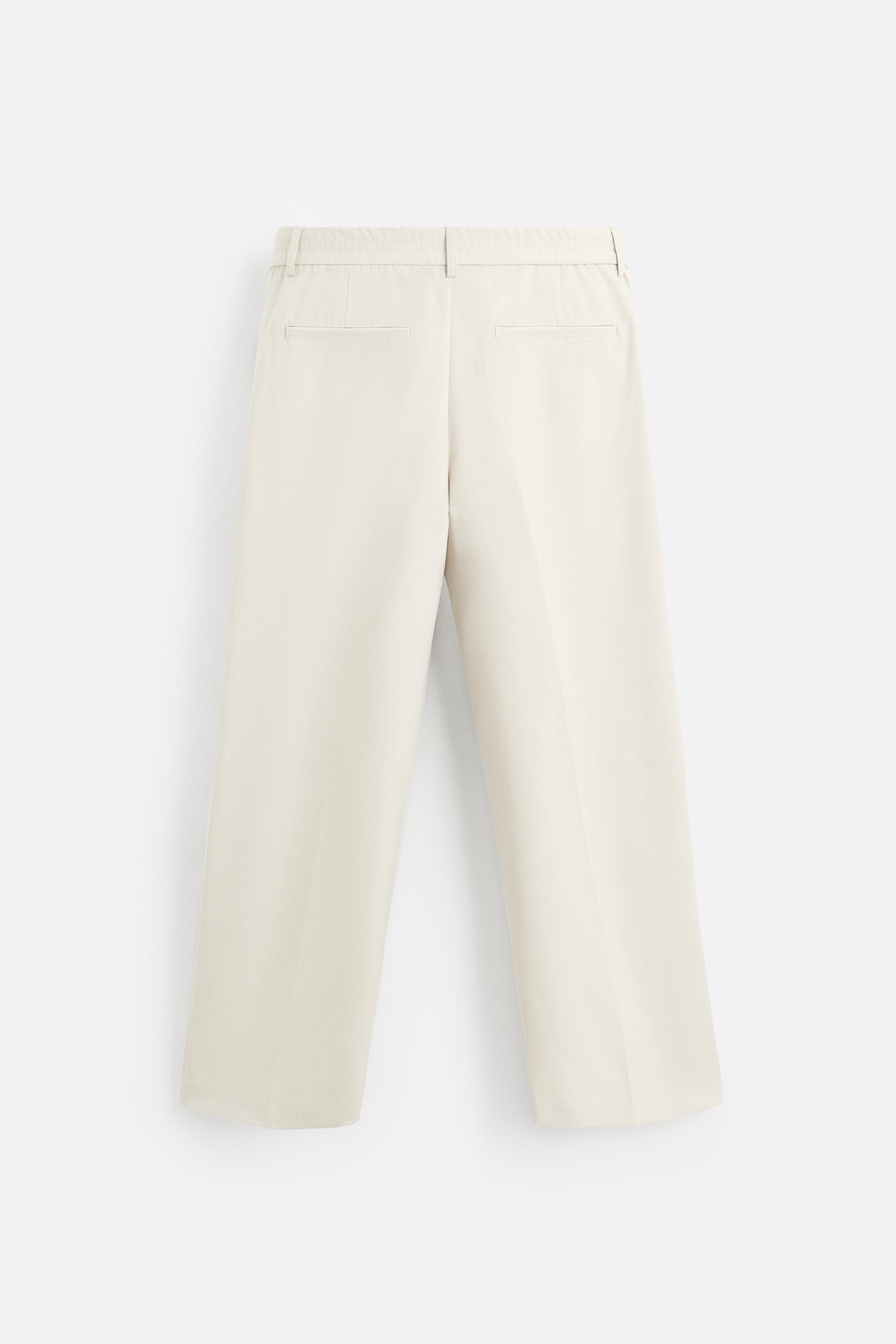 PLEATED WIDE FIT PANTS