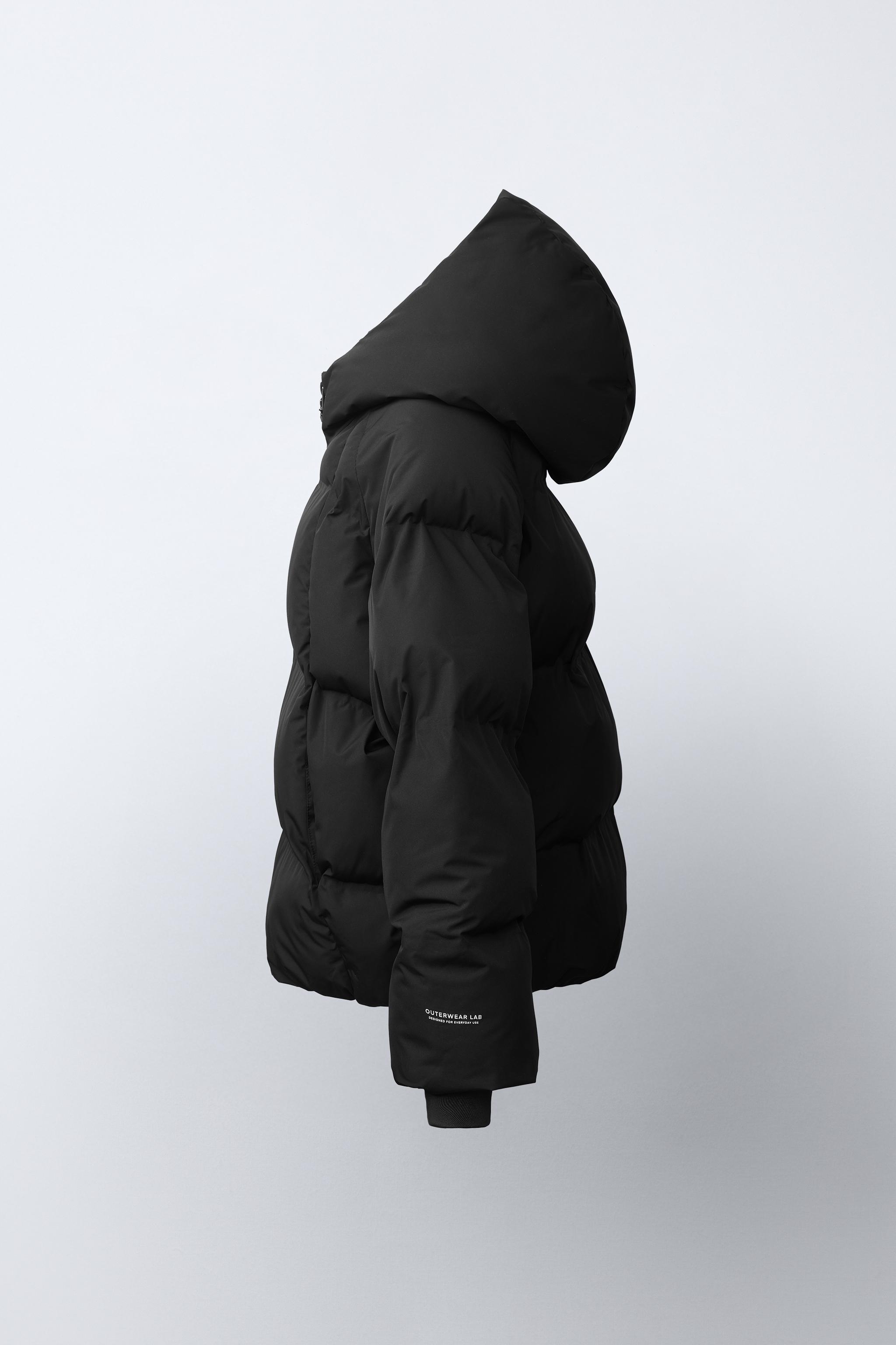 BLOUSON MATELASSÉ À CAPUCHE DÉPERLANT