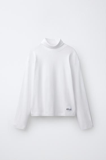 CAMISETA CUELLO VUELTO ETIQUETA - Blanco de Zara