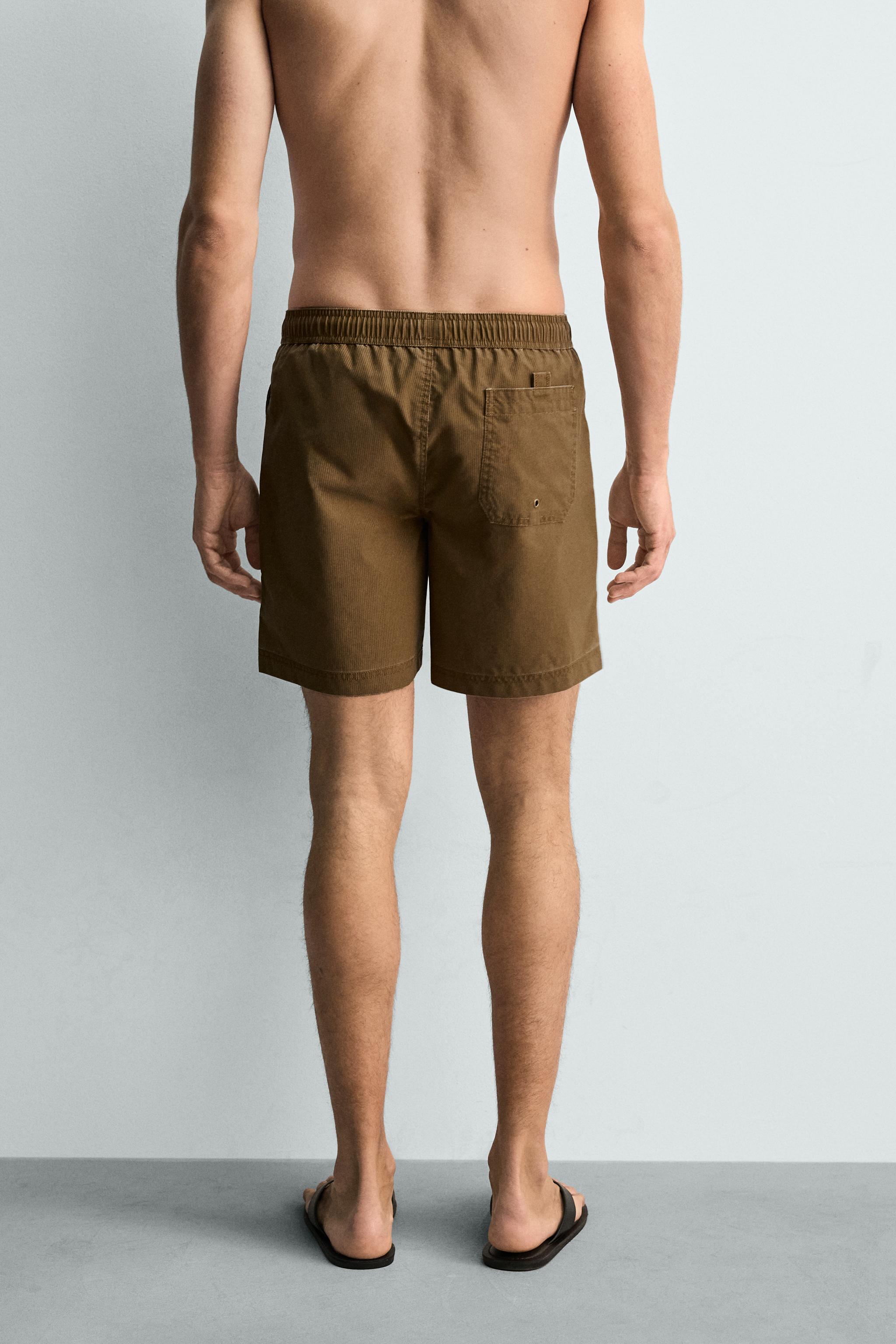 MAILLOT DE BAIN LONG À RAYURES DÉLAVÉES
