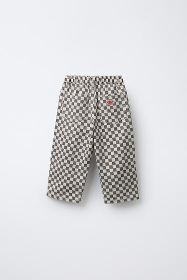 PANTALON BAGGY EN SERGÉ À CARREAUX DAMIER - Écru / Marron de Zara - Image 1