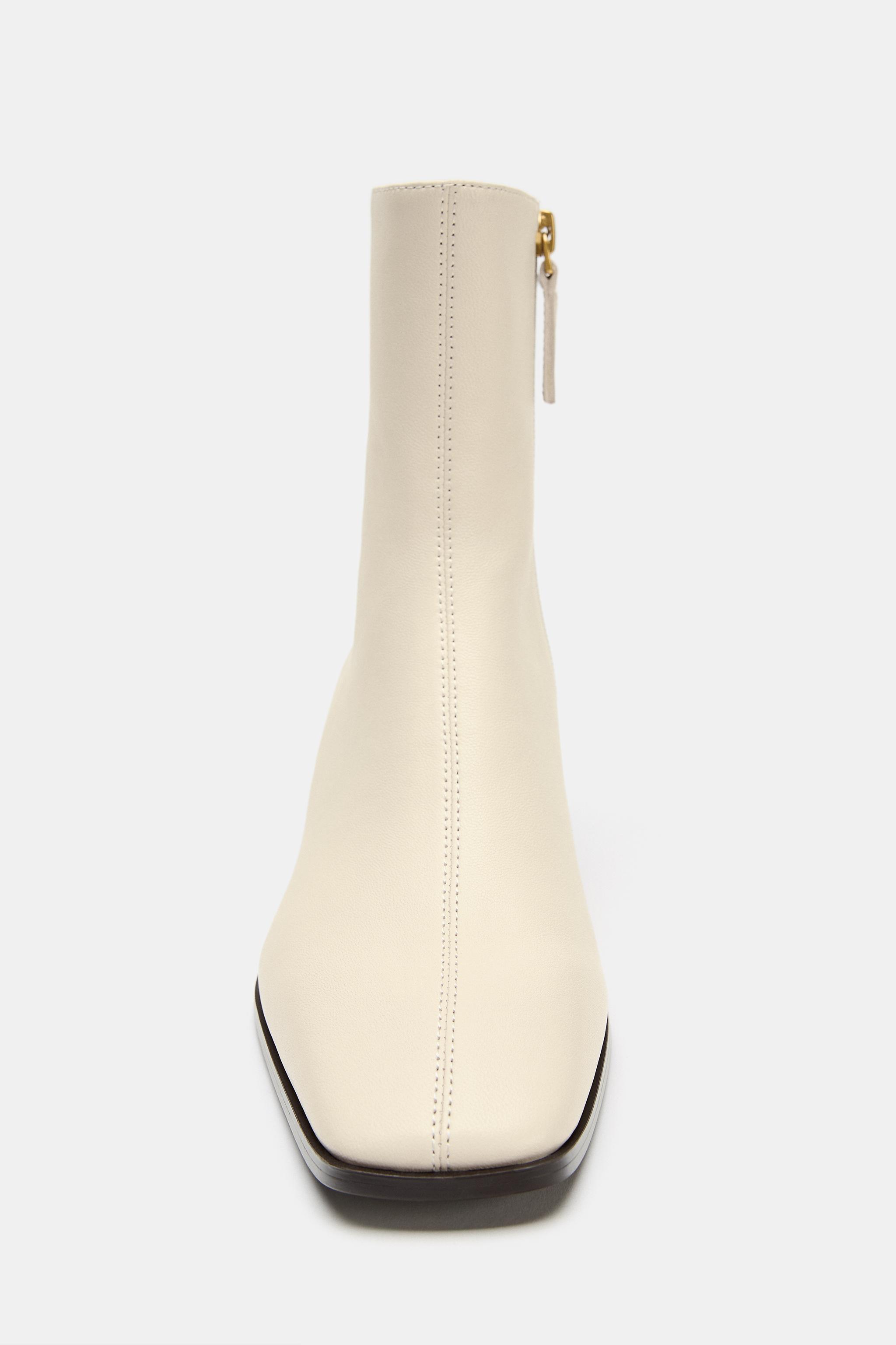 BOTTINES À TALONS EN CUIR