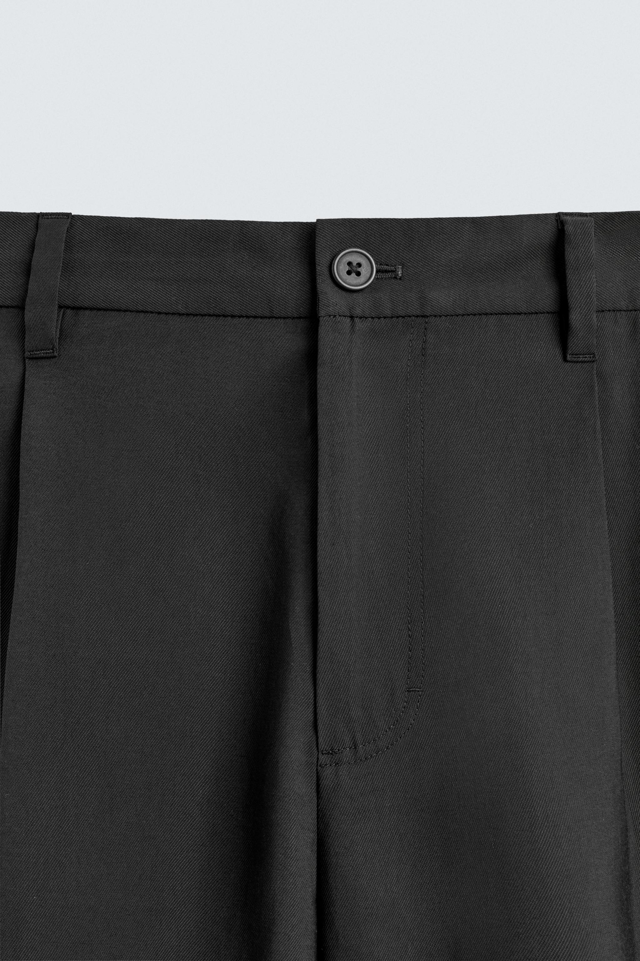 FLOWY PLEATED PANTS
