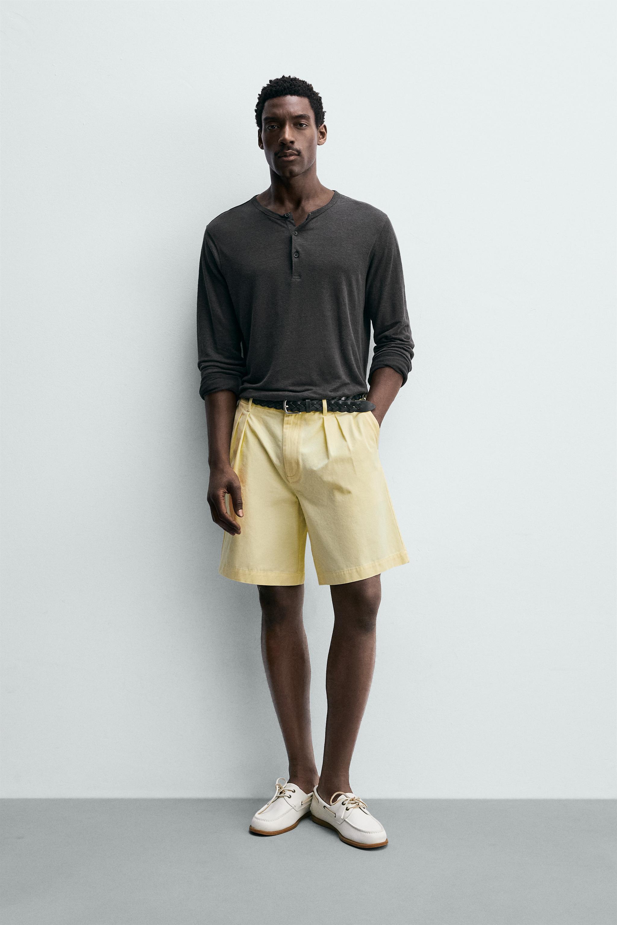 RELAXED FIT PLEATED SHORTS