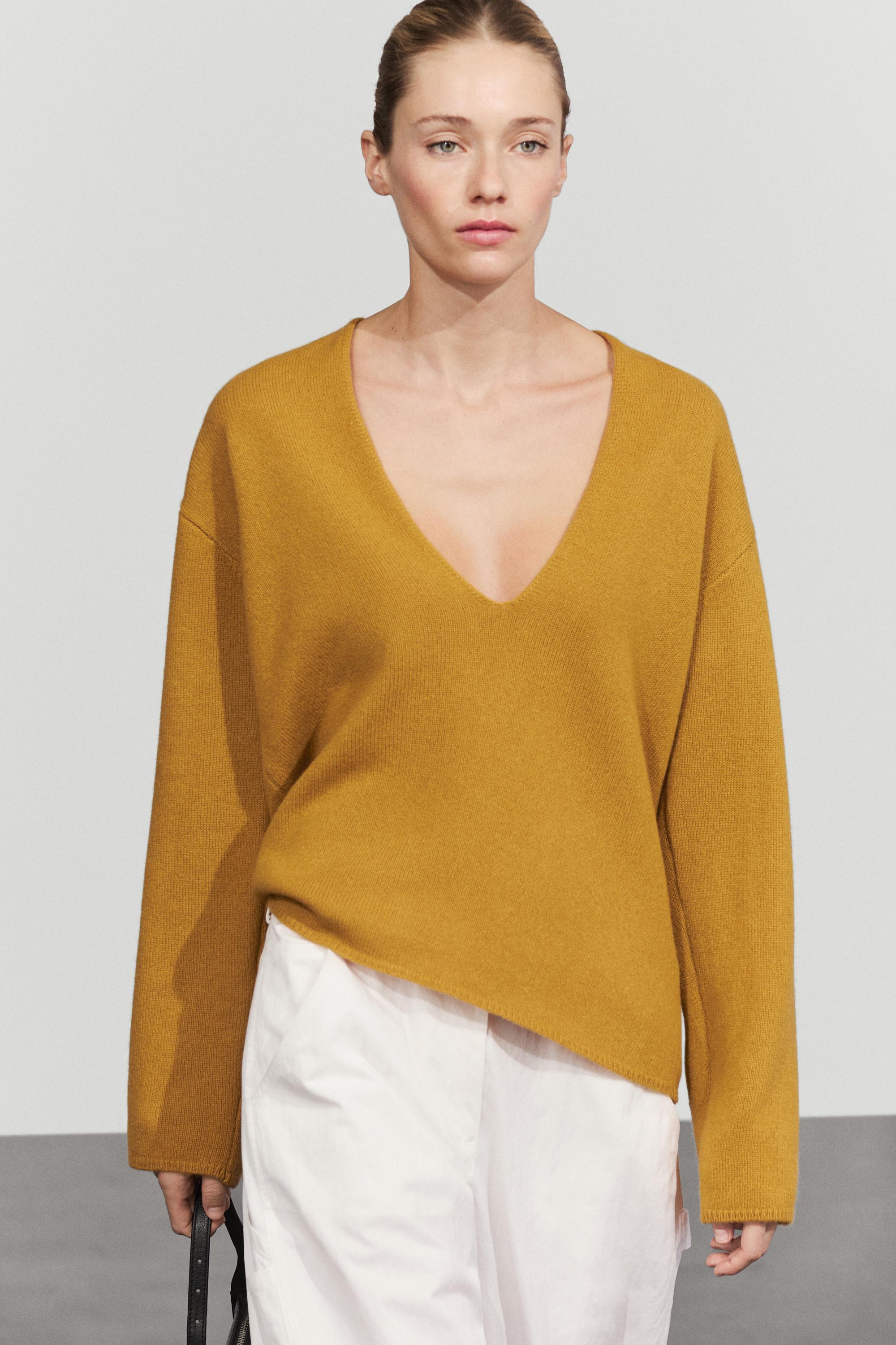 Long-line knit sweater with neckline detail — Mustard