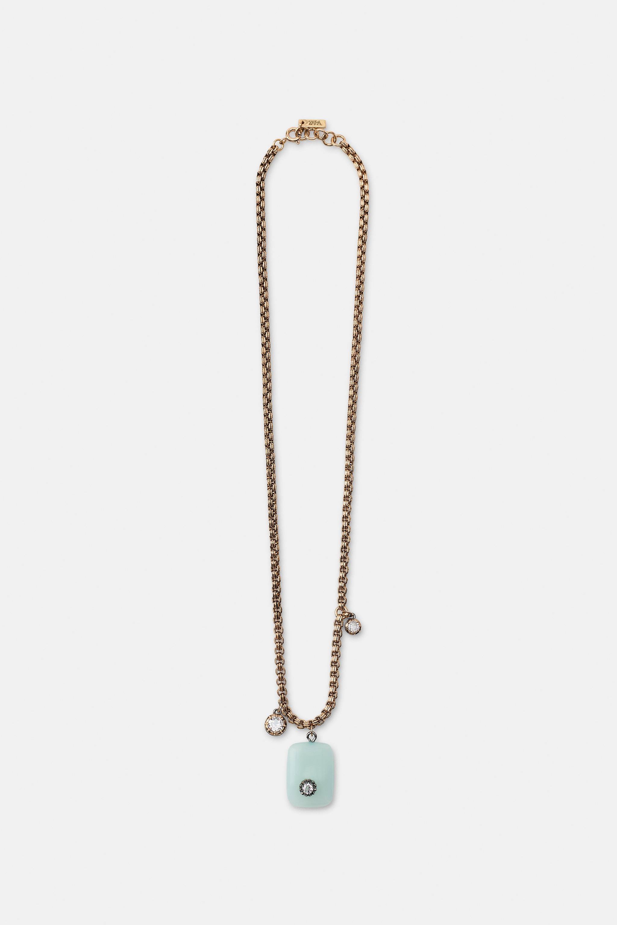 METALLIC STONE AND RHINESTONE NECKLACE — Aged gold