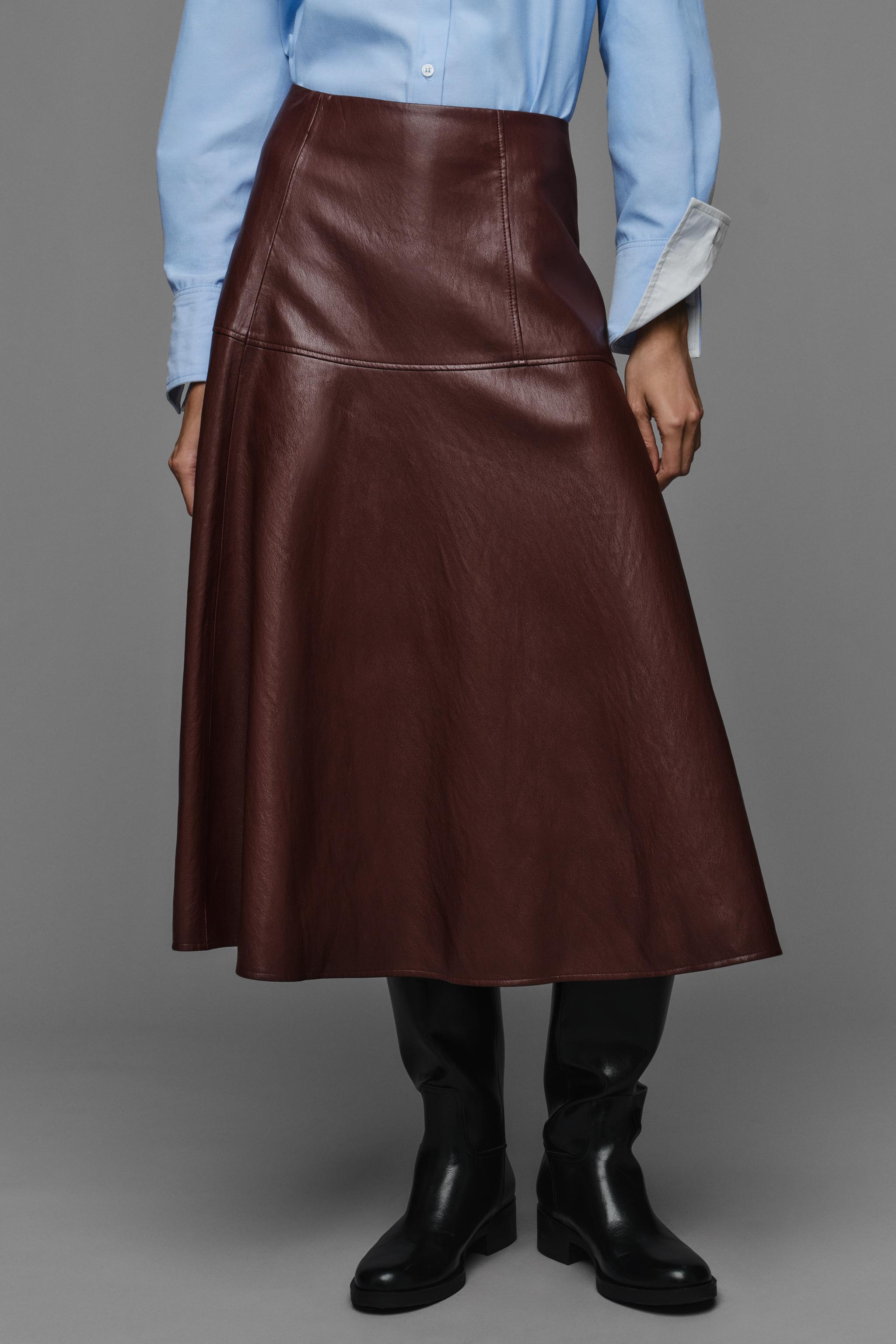 JUPE MI-LONGUE CAPE EN MATIÈRE SYNTHÉTIQUE