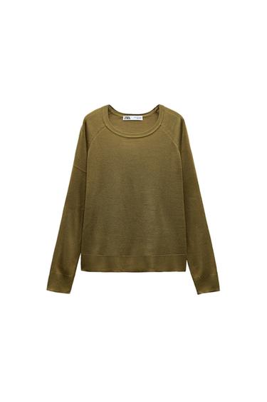 Front view of an olive green jumper with a crew neck and long sleeves.