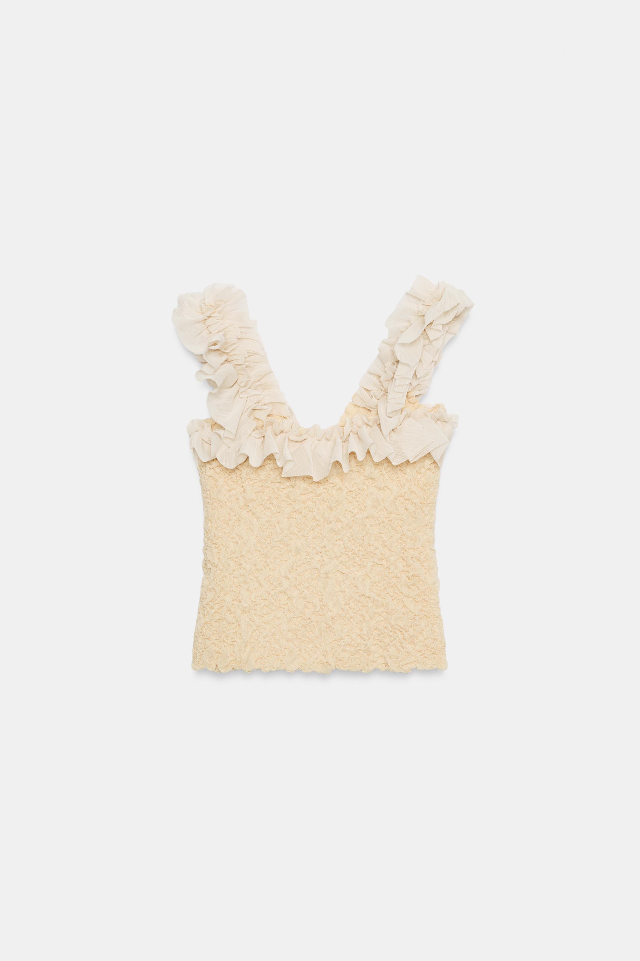 TOP ROMANTIQUE EN MAILLE BIMATIÈRE