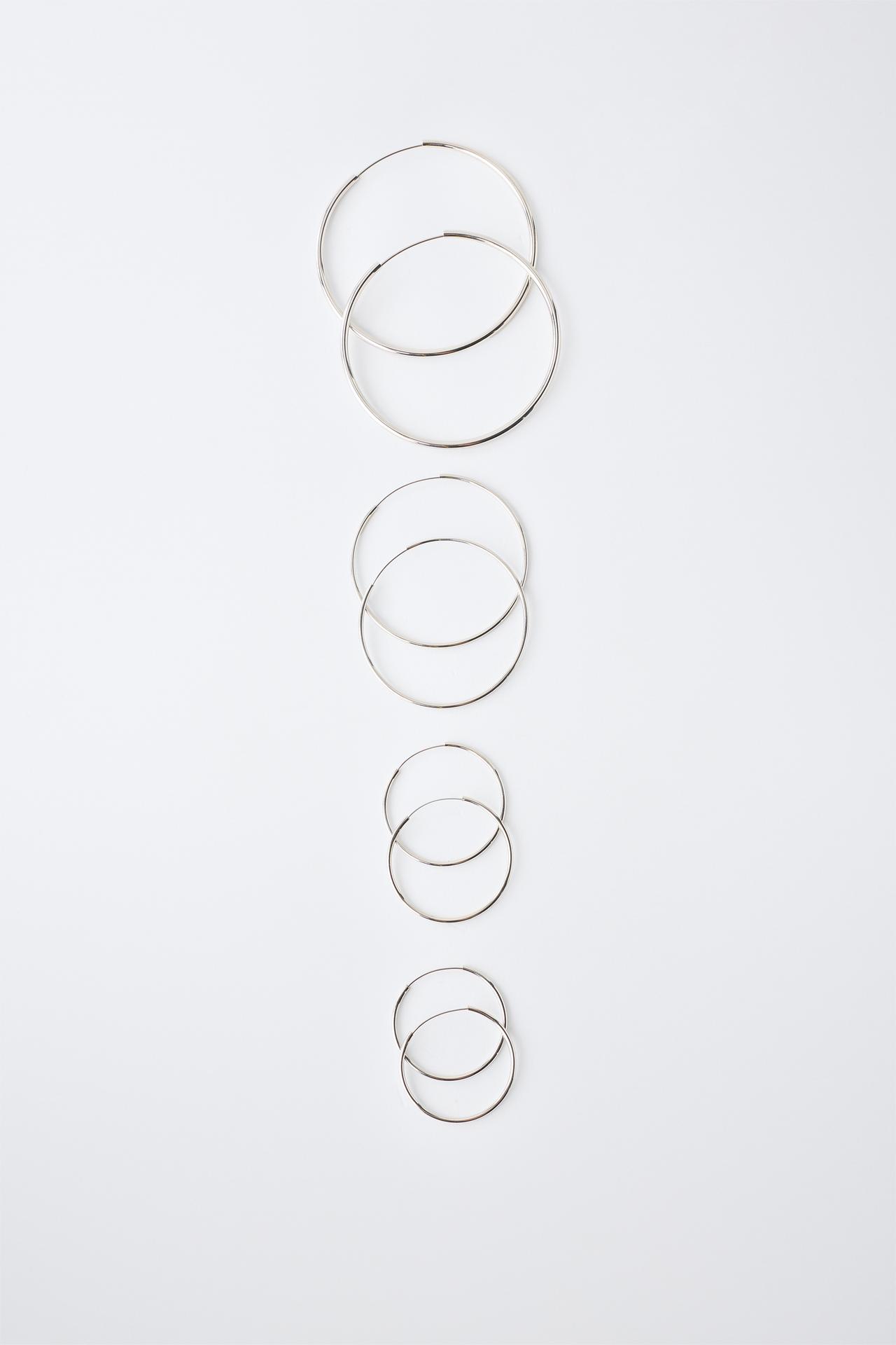 FOUR-PACK OF HOOP EARRINGS — Silver