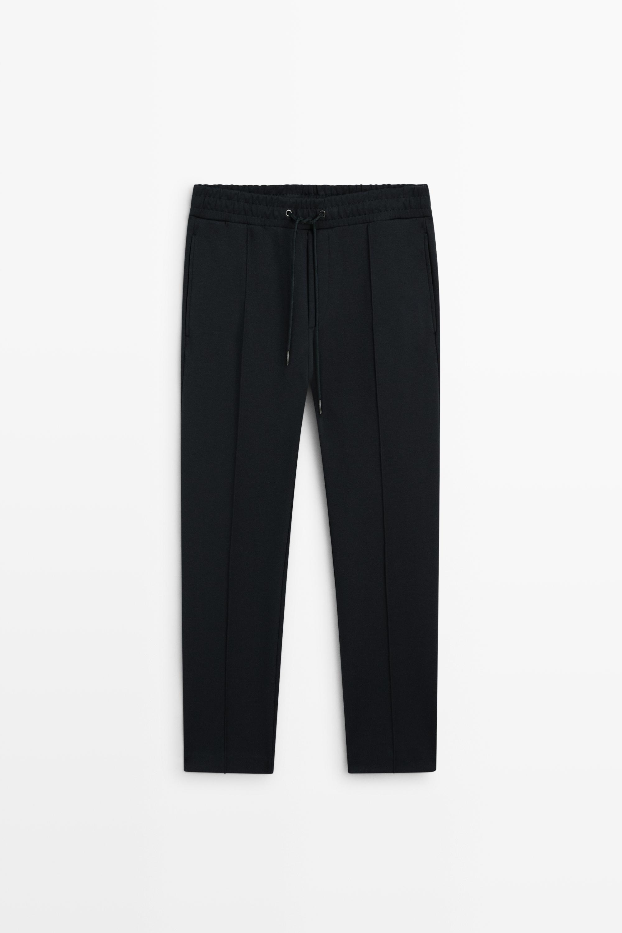 Pantalon à détails de coutures, total look